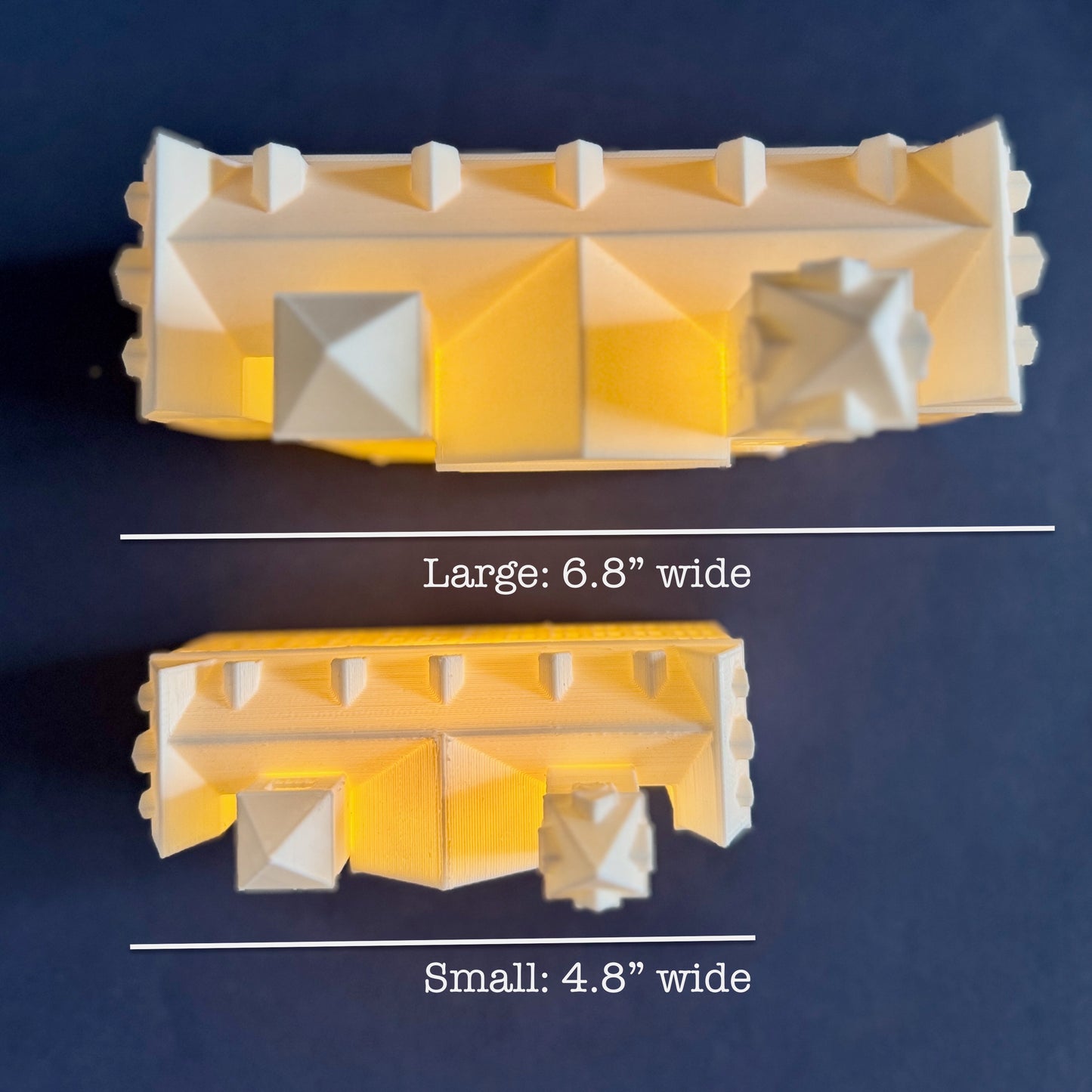The dimensions of the larger and smaller Auburn figurines.