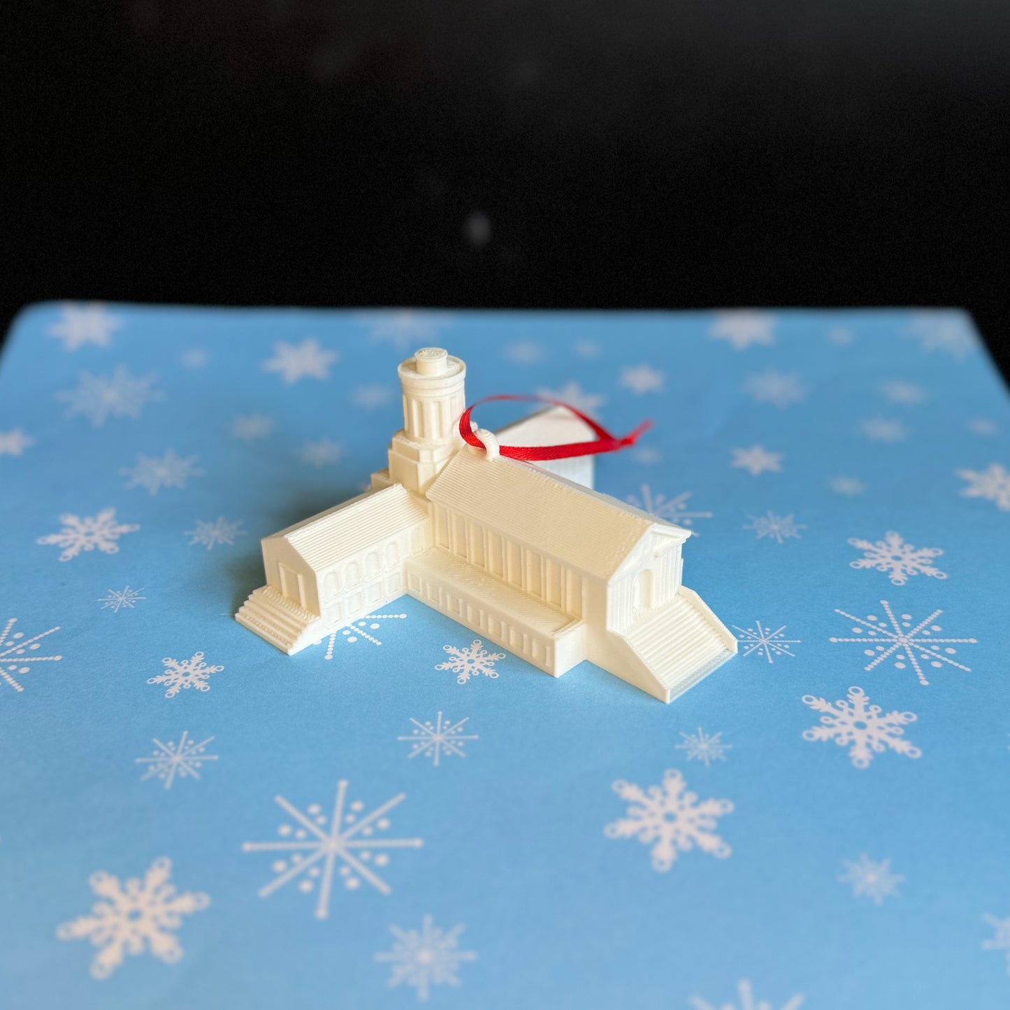 The Carnegie Mellon ornament, shown against a Christmas background.