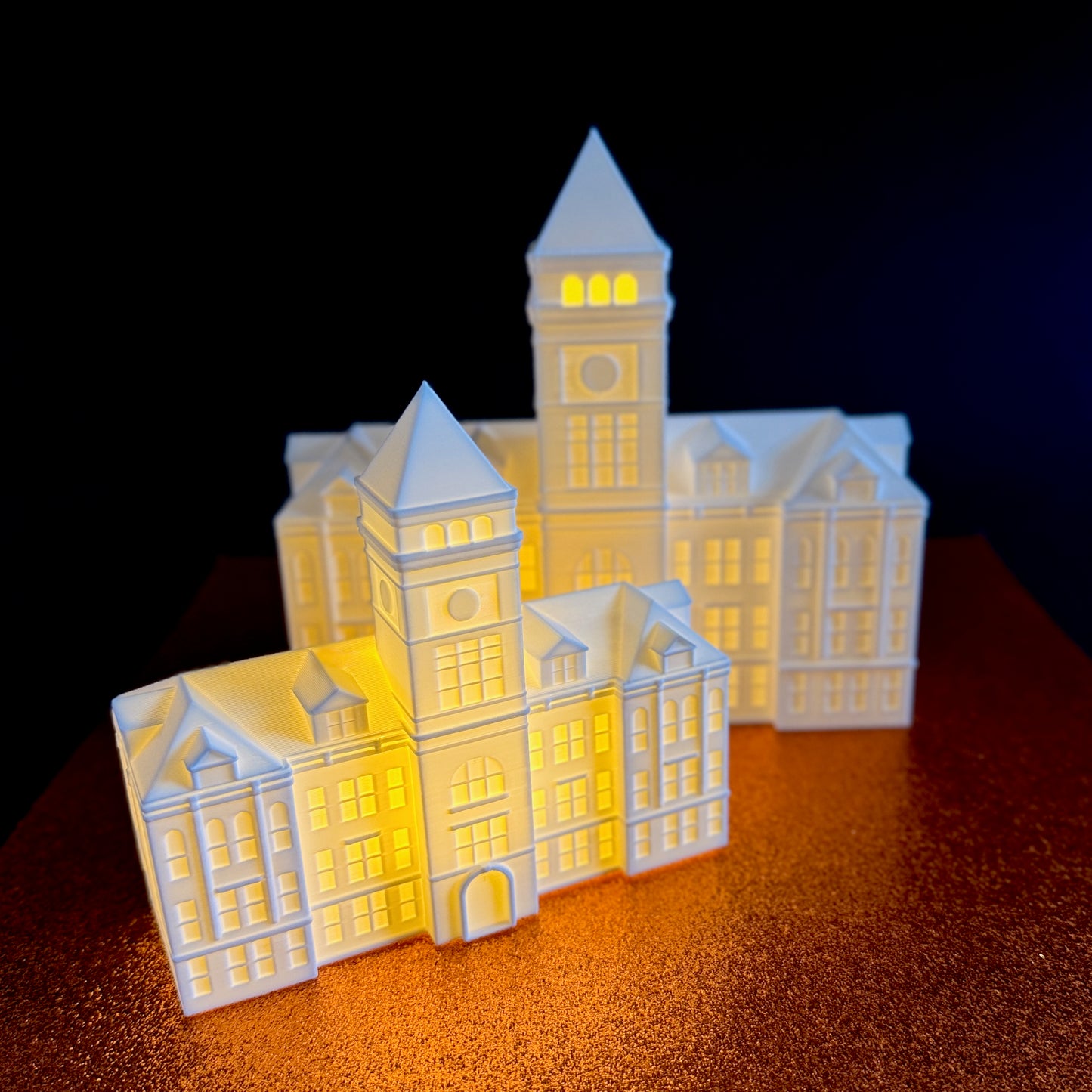 The small and large Clemson Tillman Hall figurines.