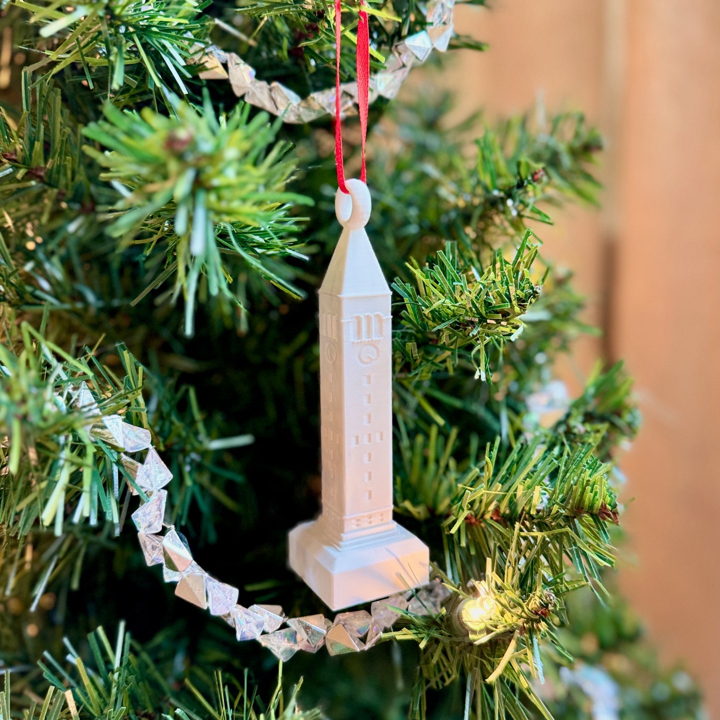 Cornell University McGraw Tower ornament celebrating Big Red tradition during the holidays.