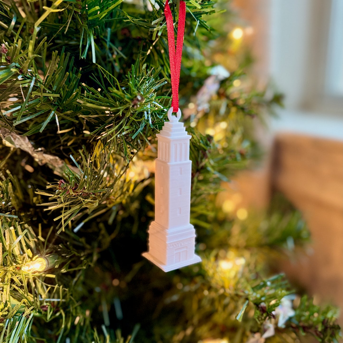The University of Alabama Denny Chimes ornament on a Bama tree.