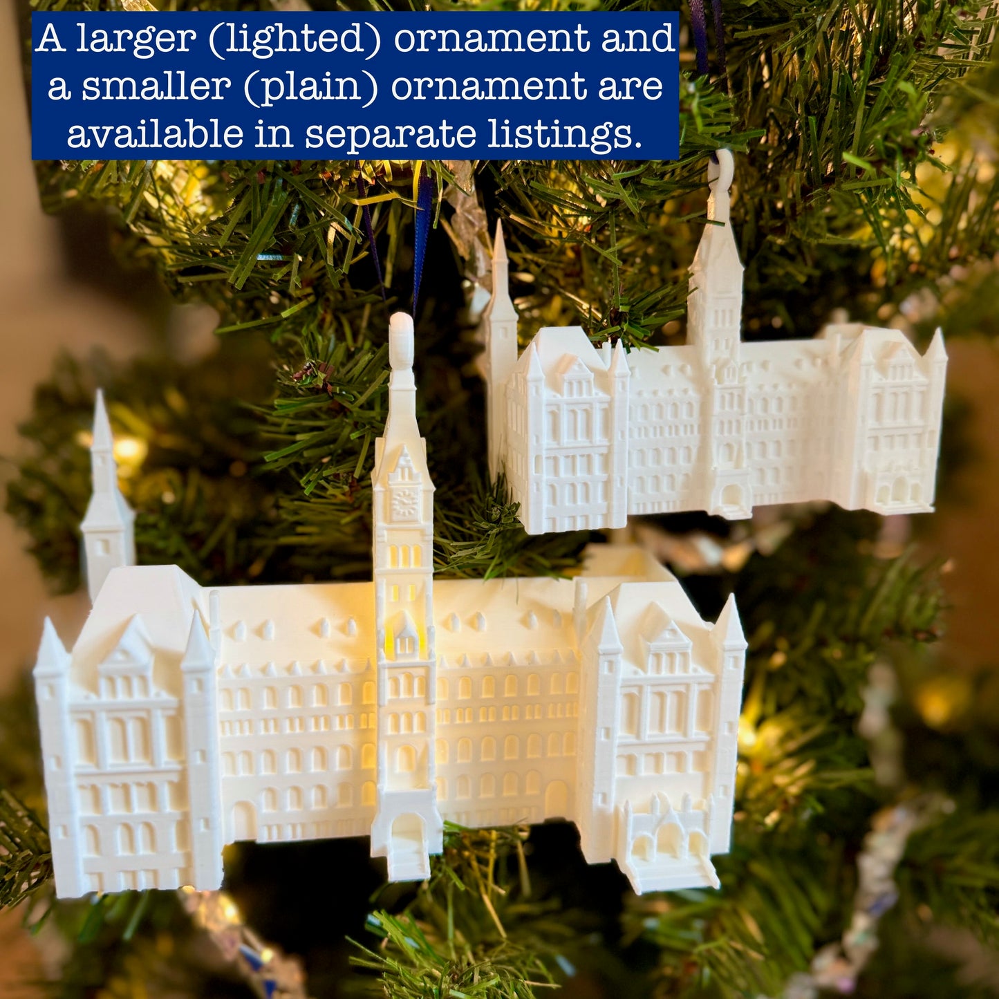 The larger and smaller Healy Hall ornaments, shown on a Georgetown Christmas tree.