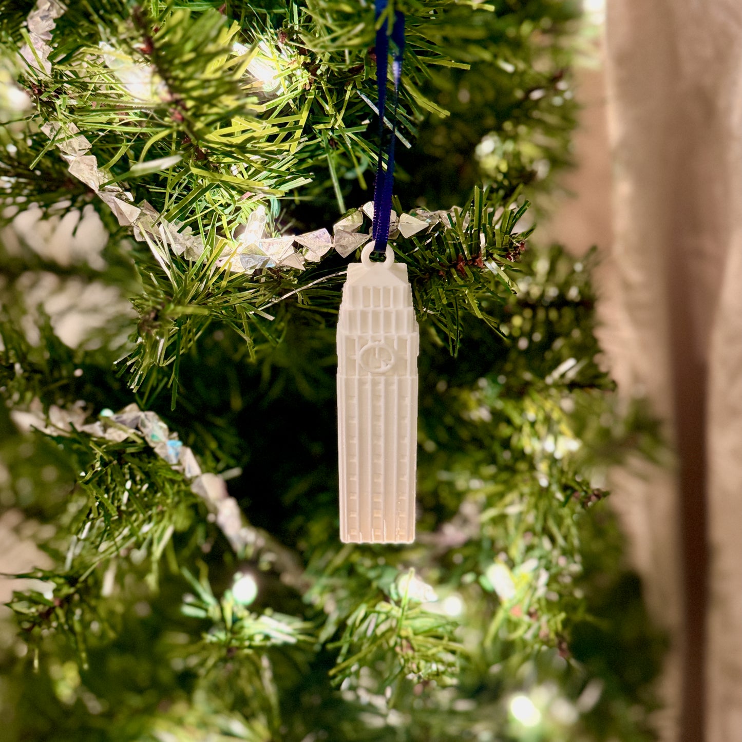The University of Michigan ornament featuring the Burton tower.