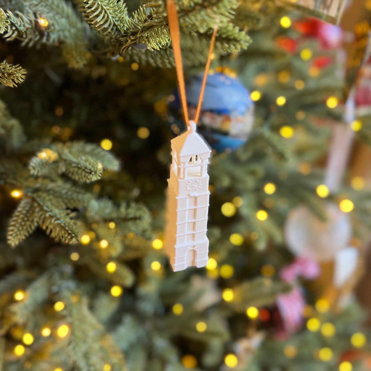 The Purdue keepsake ornament, shown on a Christmas tree.