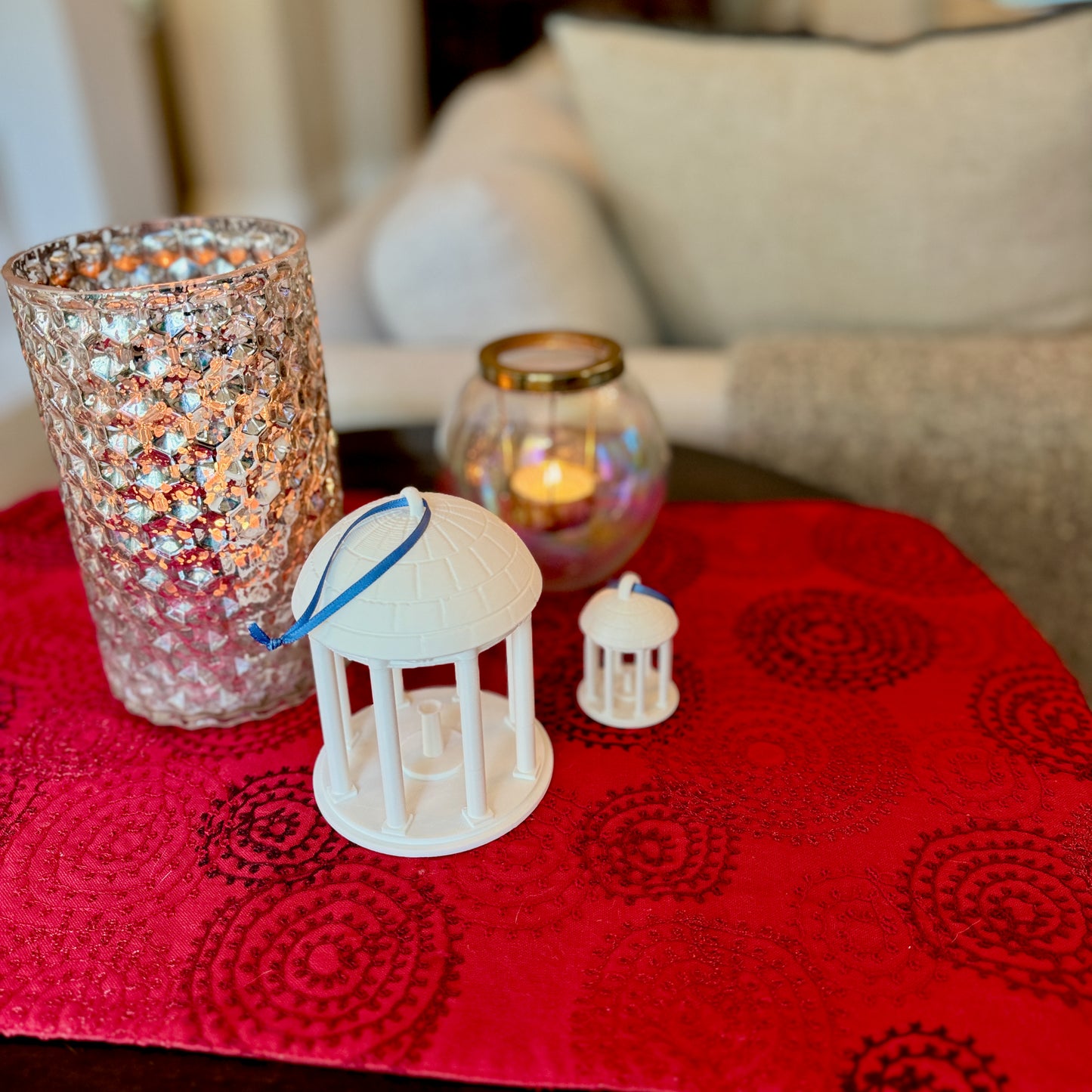 The UNC Old Well ornaments, shown in a home decorated for Christmas.