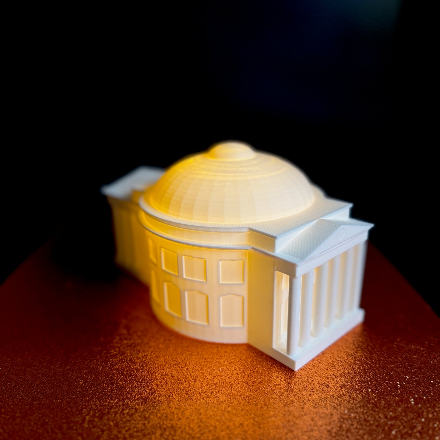 The UVA Rotunda figurine, shown in detail with an LED light.