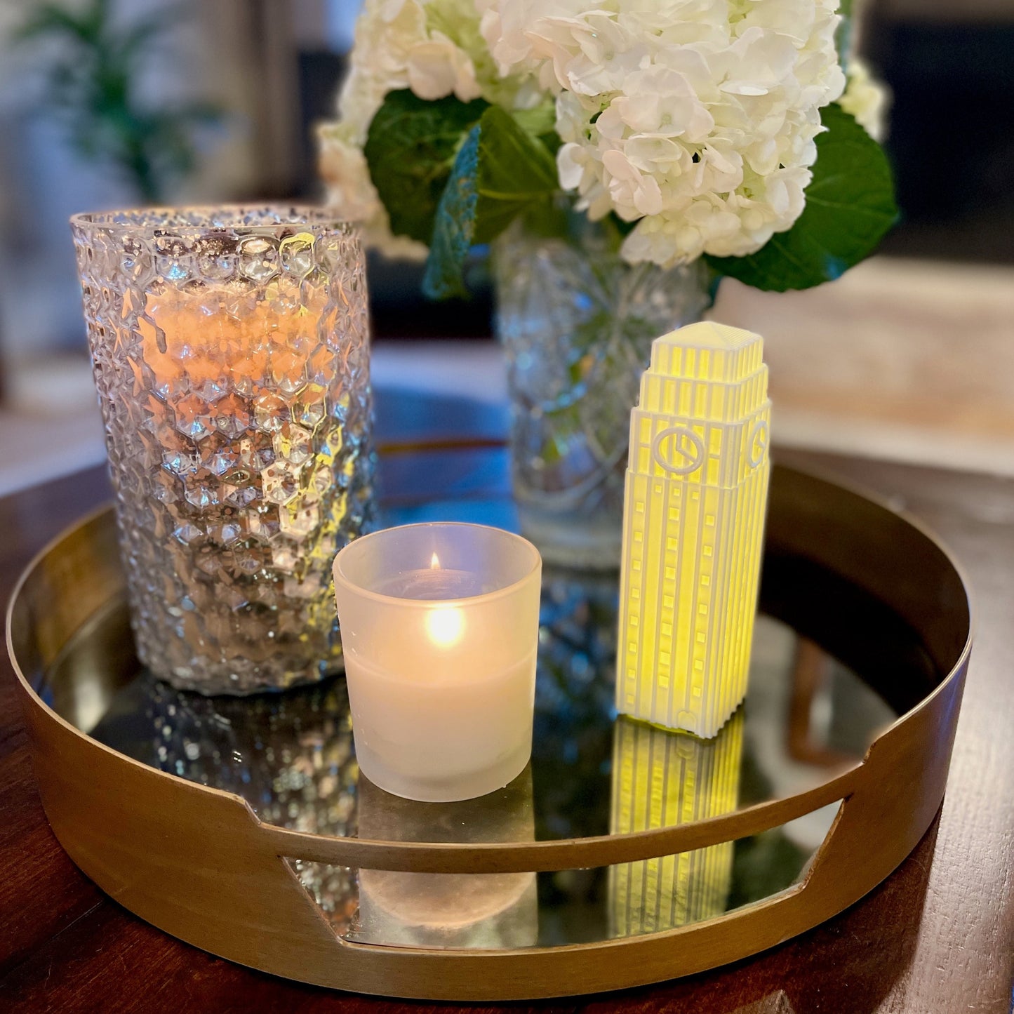 The University of Michigan dorm decor gift, styled on a living room tray.