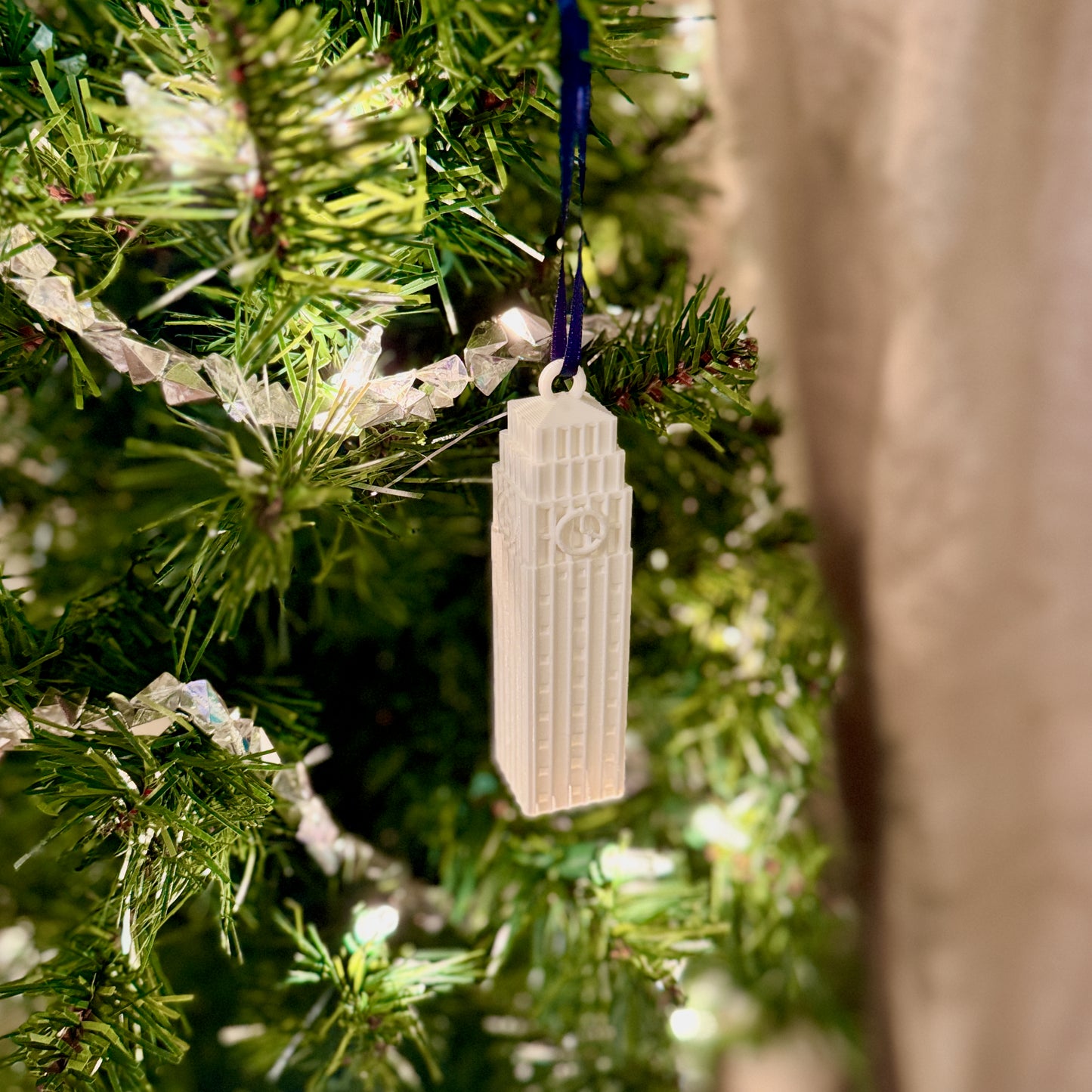 The University of Michigan ornament, shown on a Michigan tree.