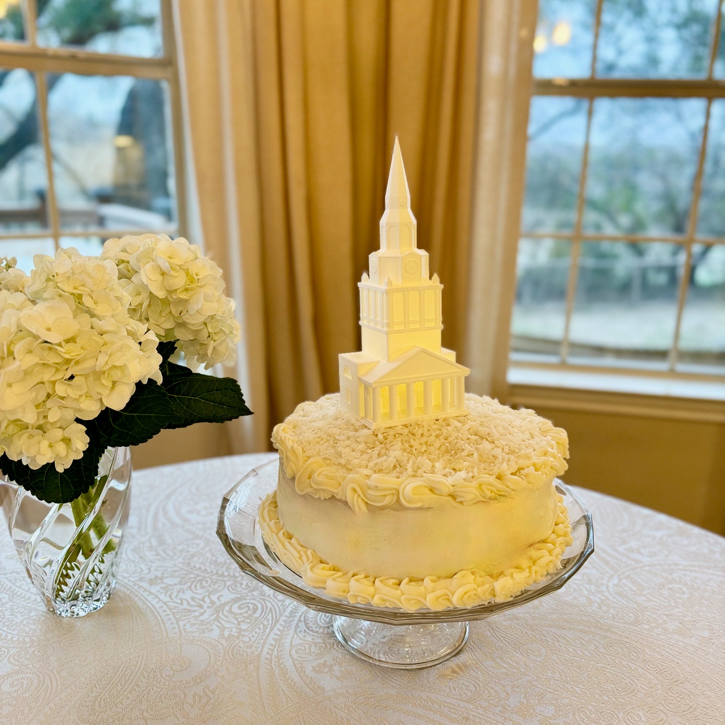 The Wake Forest cake topper light, designed as a replica of Wait Chapel and shown on a Wake Forest groom's cake.