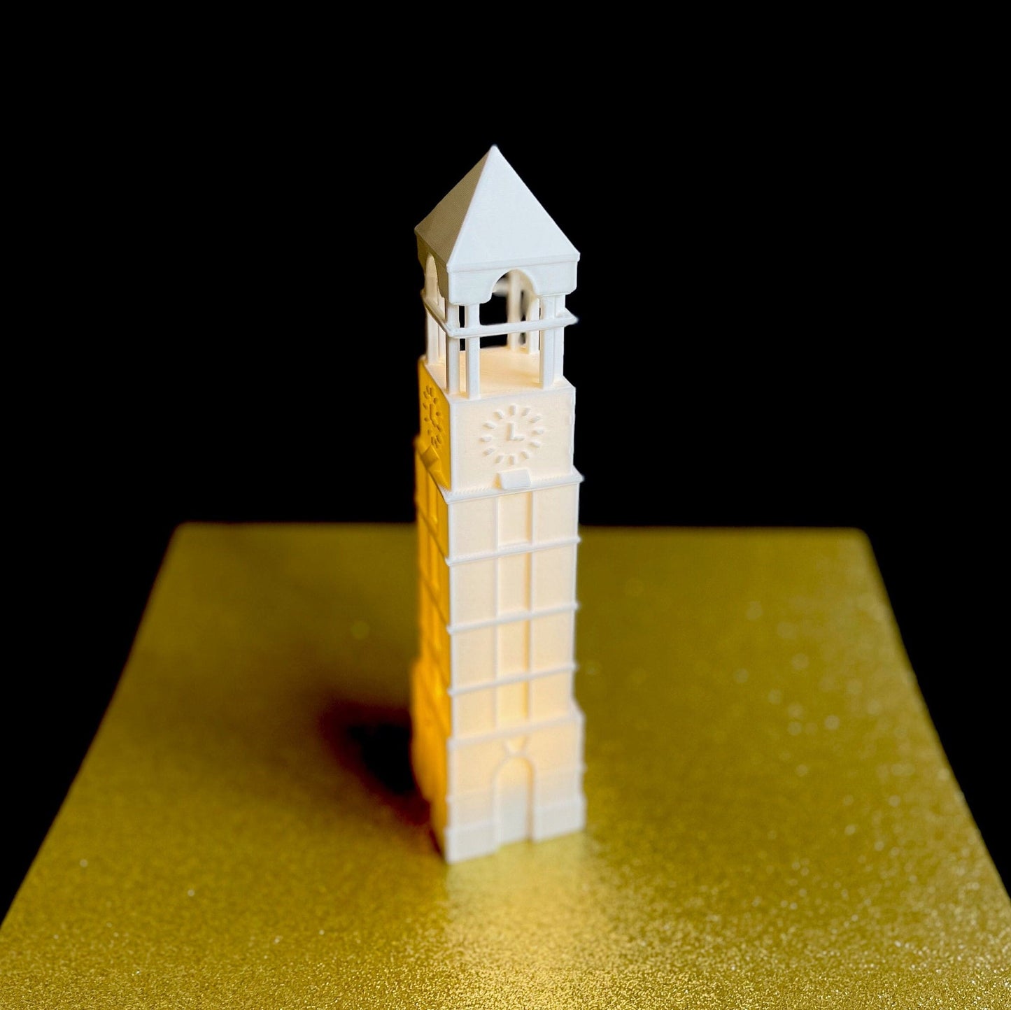 The Purdue graduation party decoration, shown against a gold background.