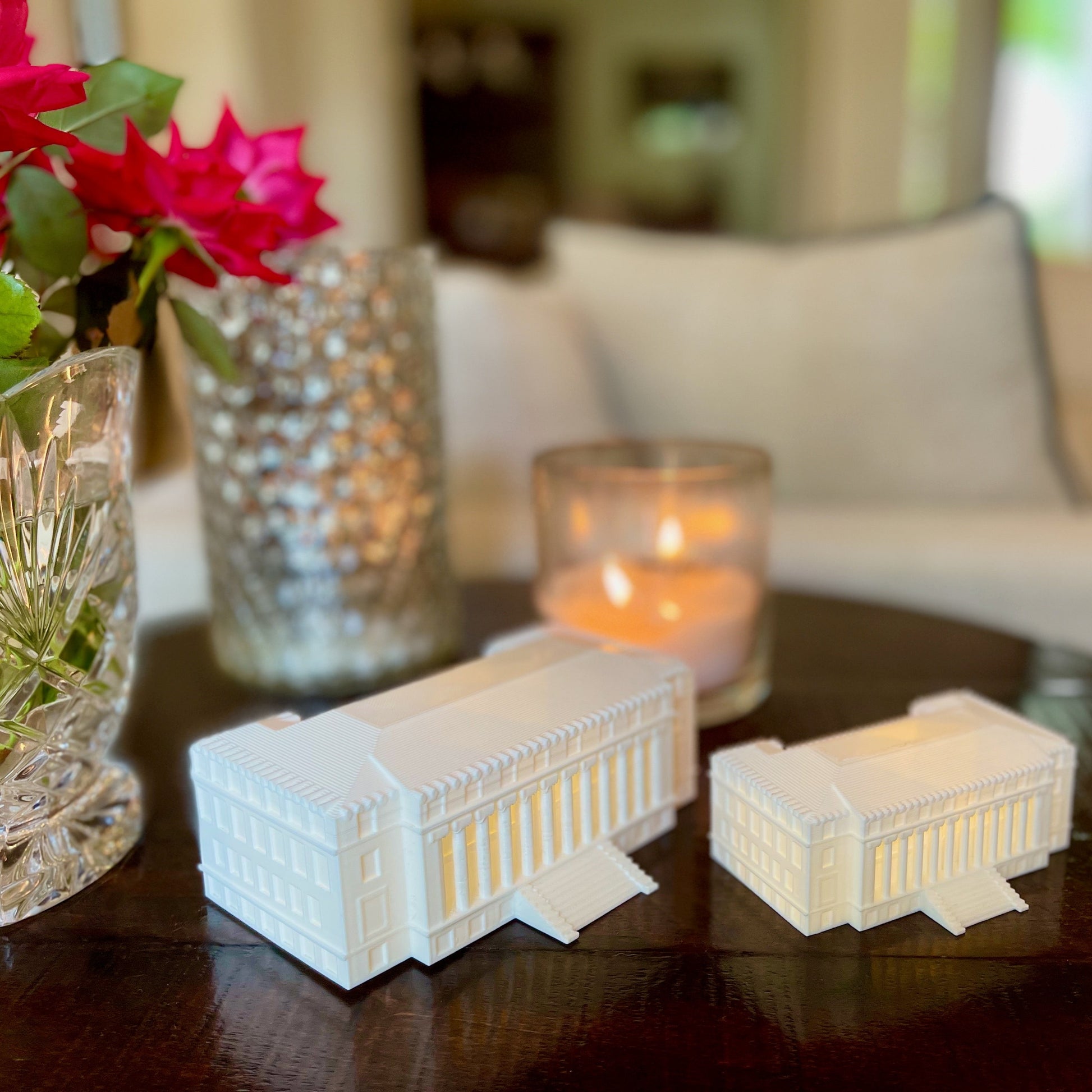 The two sizes of the Texas A&M office accessories, shown on a side table.