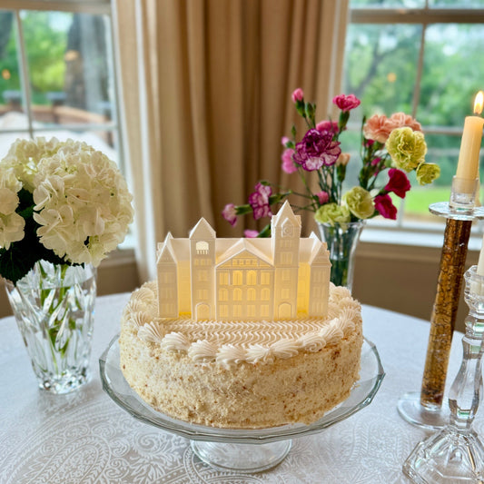 The Auburn Samford Hall figurine, used as a cake topper on a groom's cake.