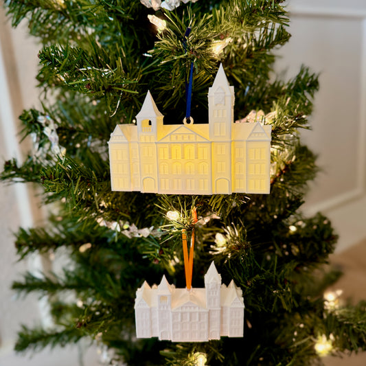 Two Auburn ornaments shown on a tree for an Auburn Tigers fan.