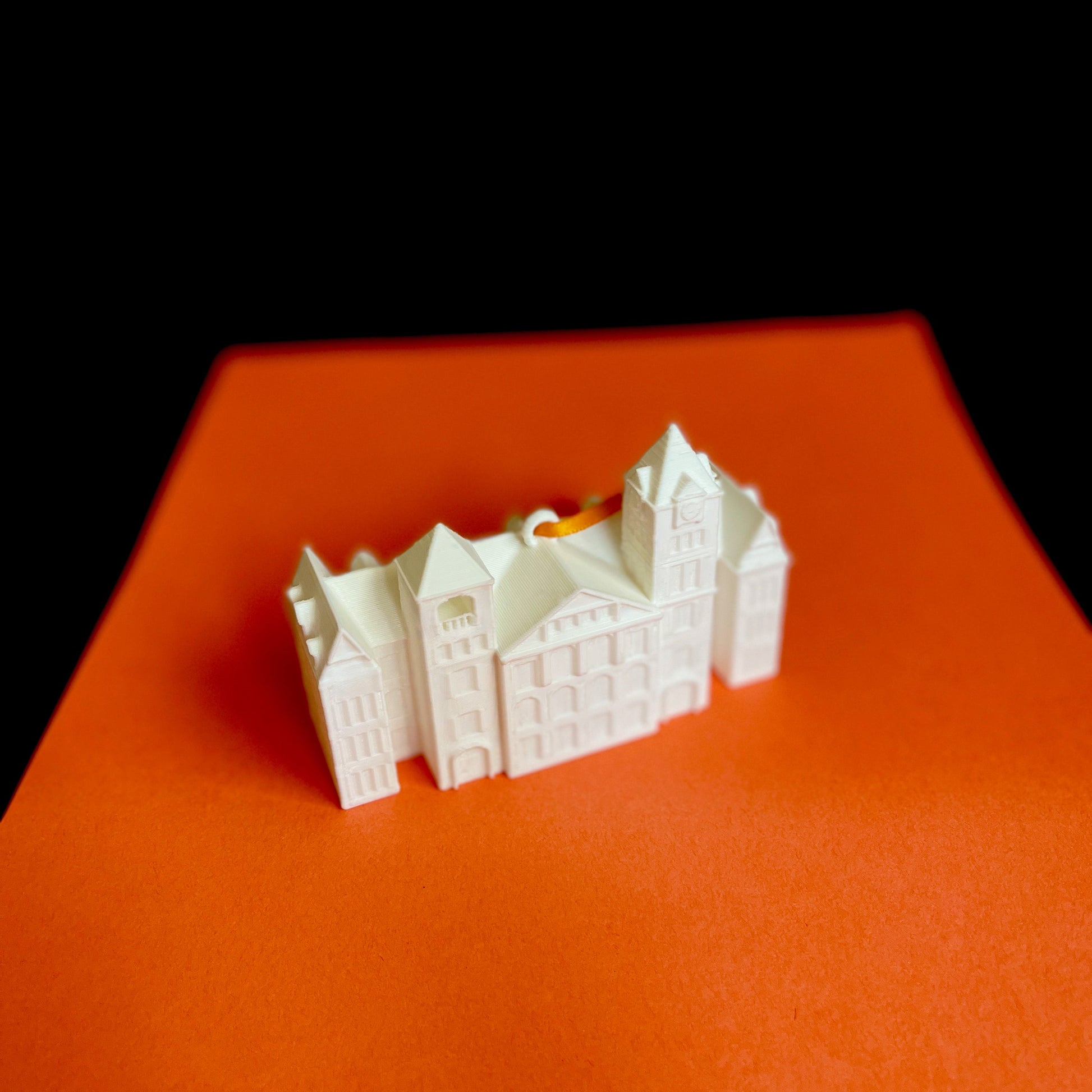 The Auburn Christmas ornament featuring Samford Hall, shown in detail.