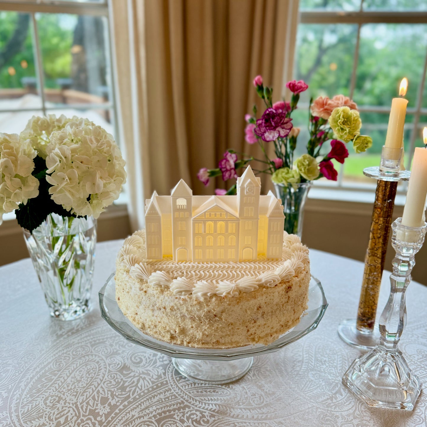 The lighted Auburn figurine of Samford Hall, used as a graduation cake topper.