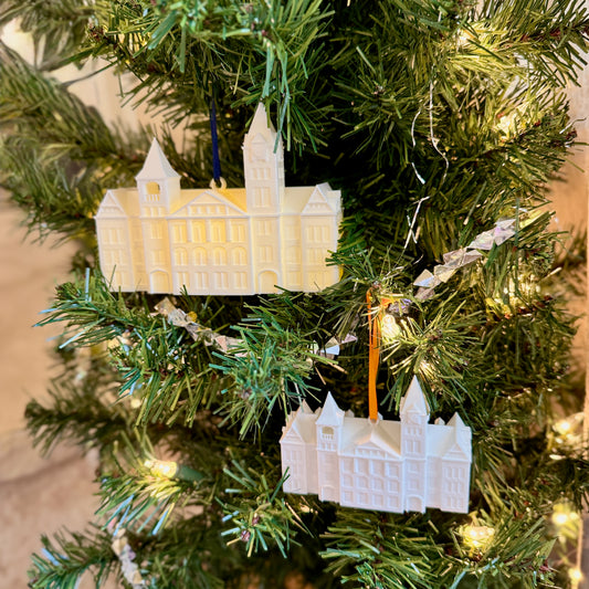 Two sizes of Auburn ornaments – large lighted and small unlit – displayed side by side