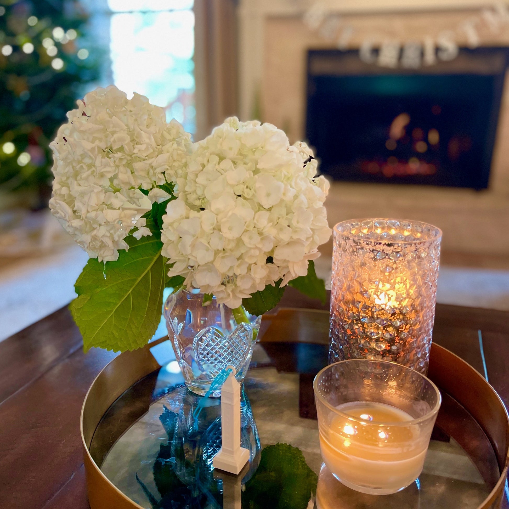 The Campanile ornament, styled in a living room.