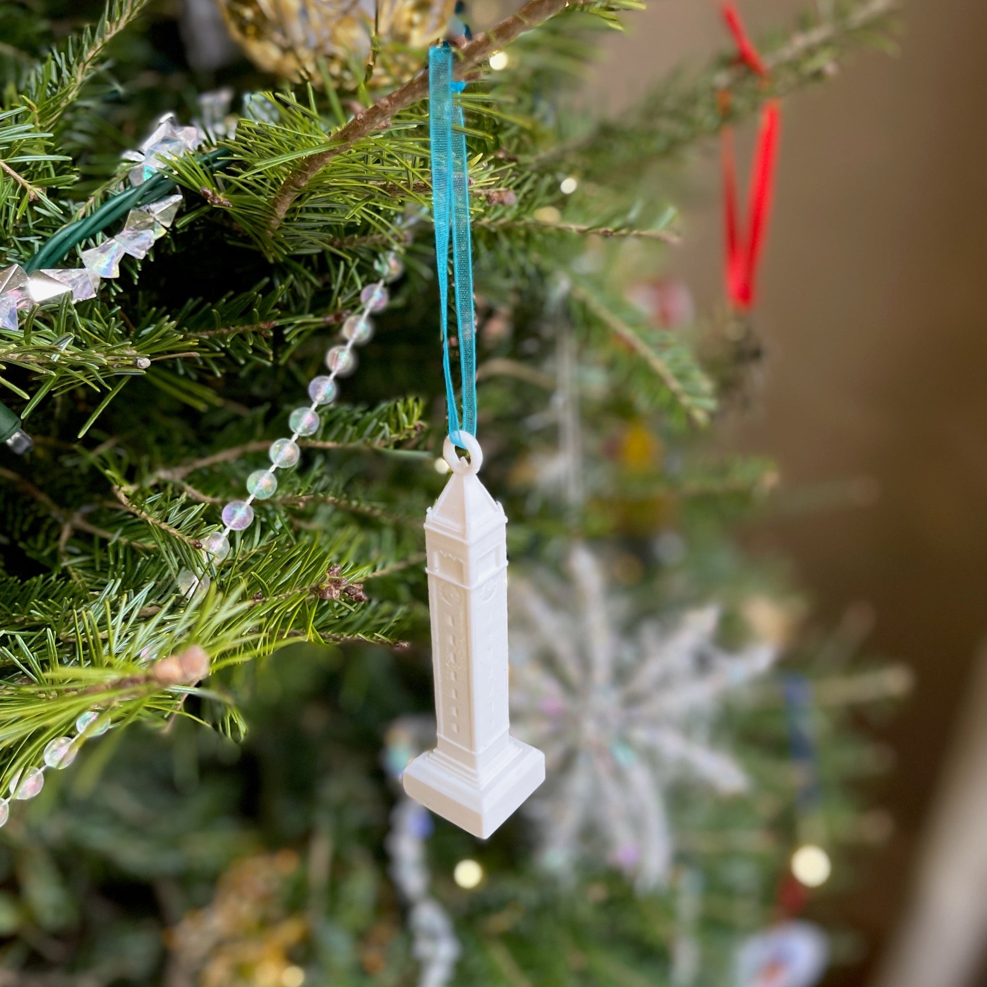 The Berkeley Campanile ornament shown on a Christmas tree.