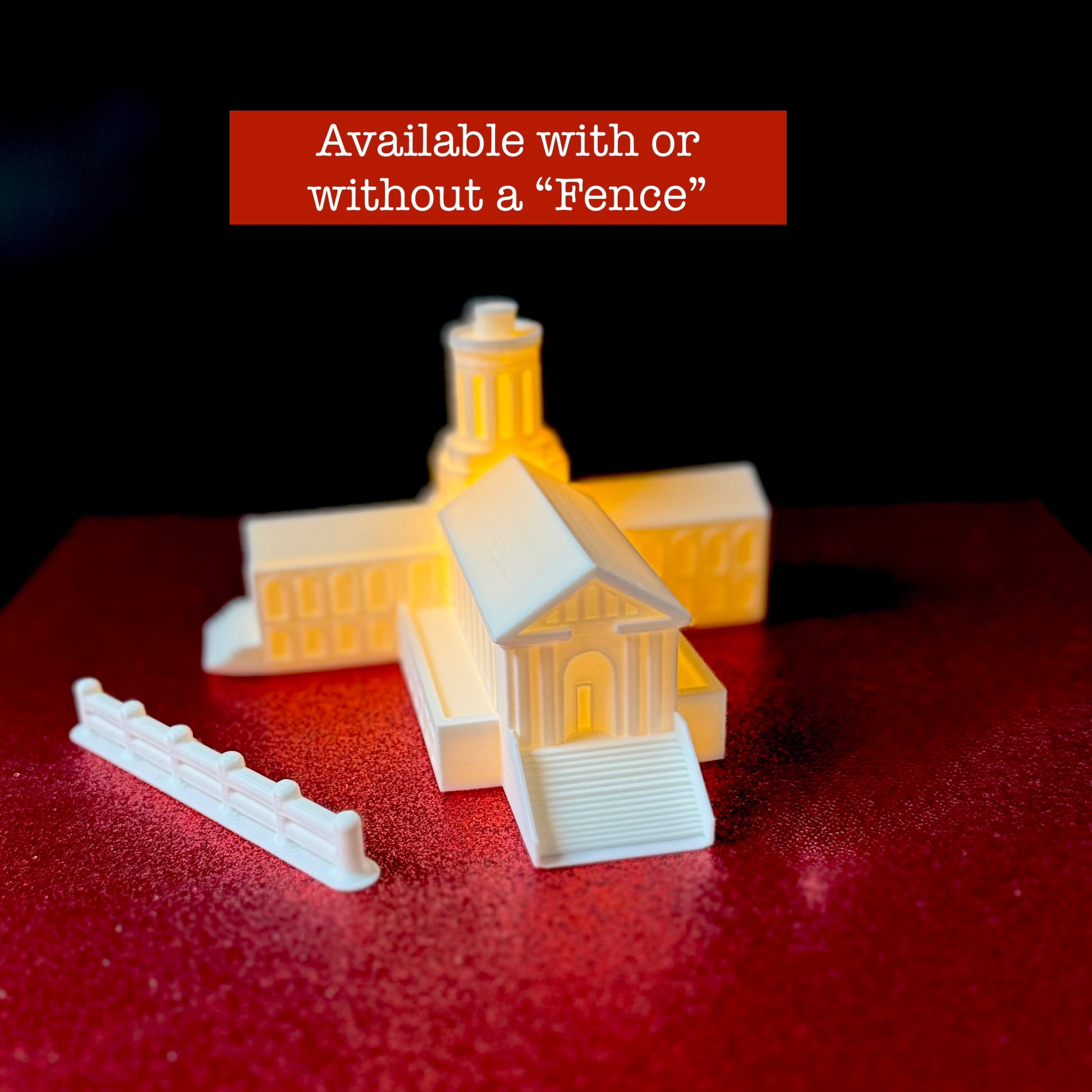 The 3d printed Carnegie Mellon fence next to the CM figurine of Hamerschlag Hall.