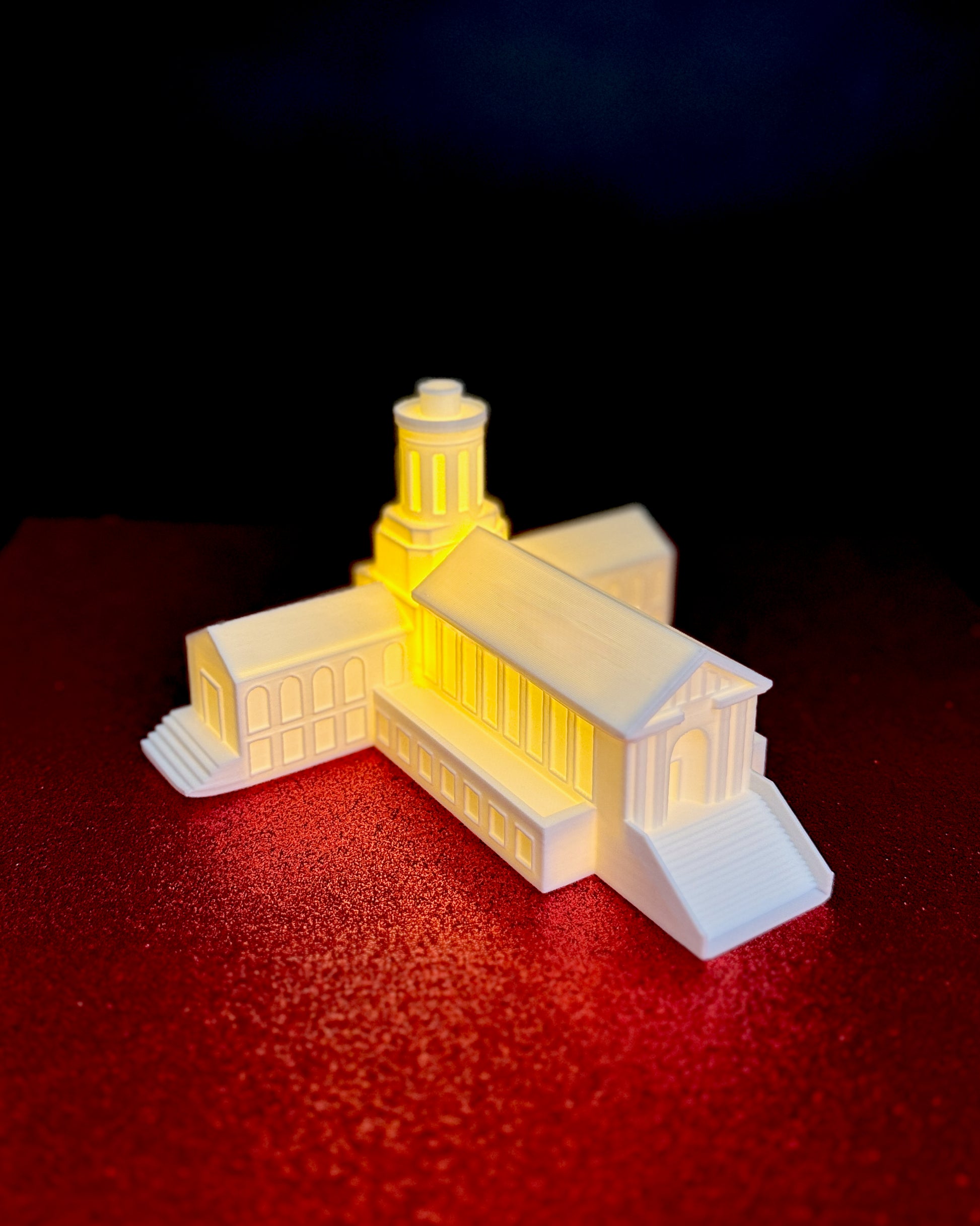The Carnegie Mellon keepsake figurine with an LED light, designed as a replica of Hamerschlag Hall.