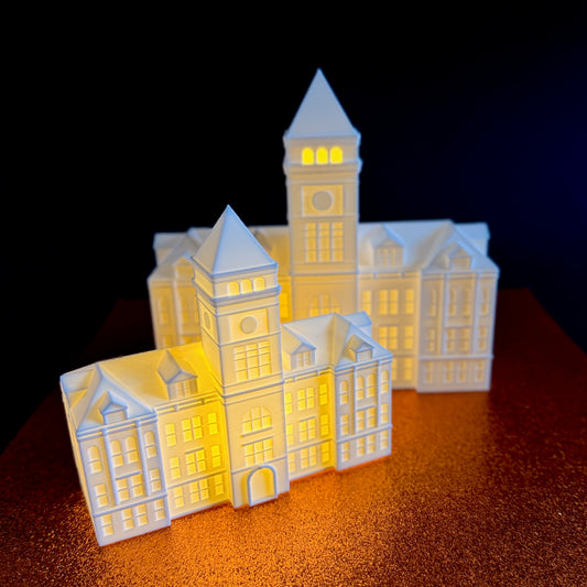 The small and large Clemson Tillman Hall figurines.