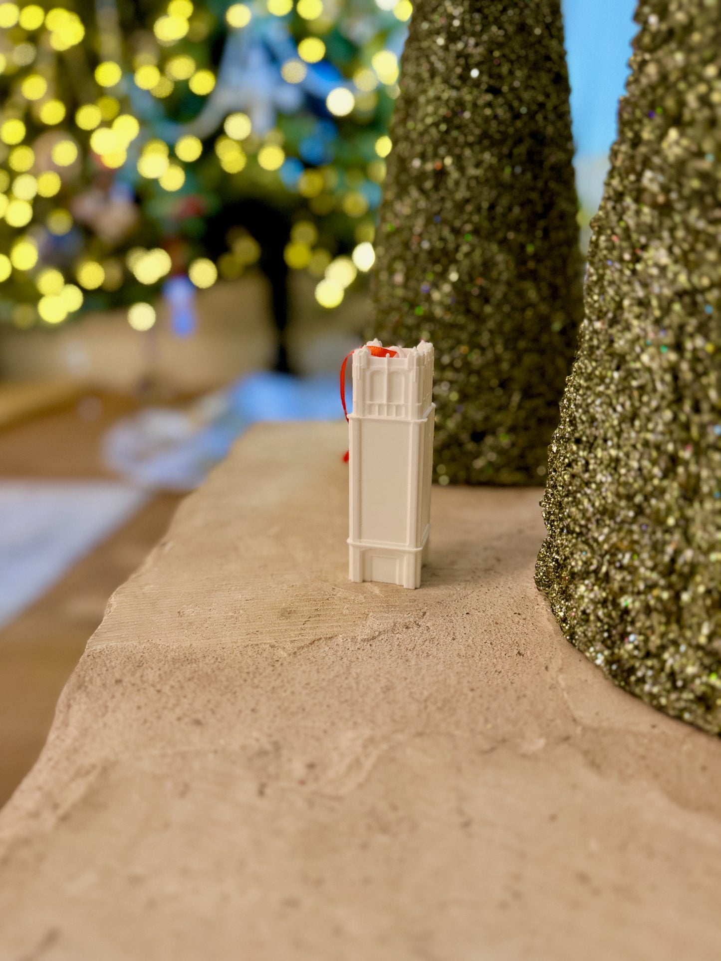 Florida Gators Christmas ornaments designed as the Century Tower building on the Gainesville campus.