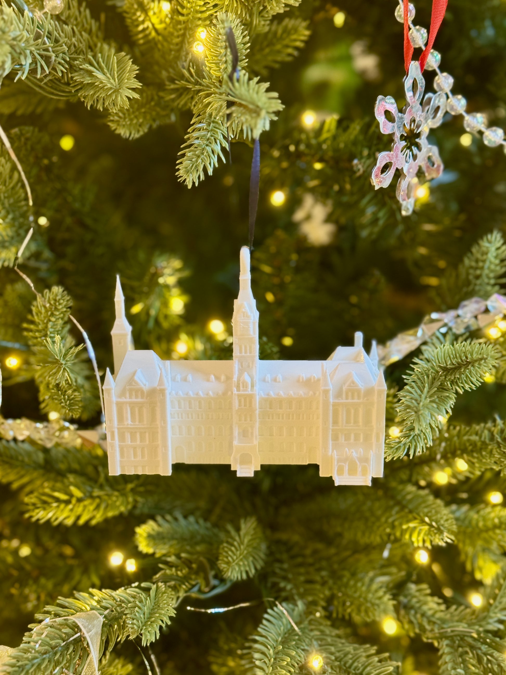 A Georgetown student ornament designed as the Healy Hall building.