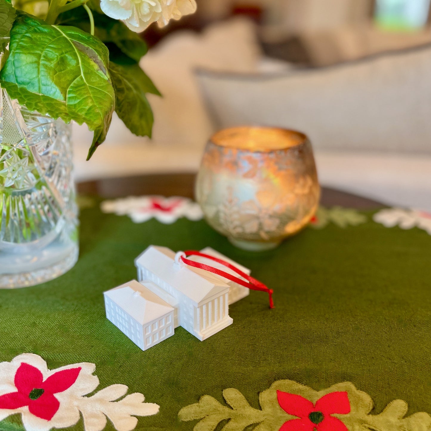 The University of Mississippi ornament, shown in a home decorated for Christmas.