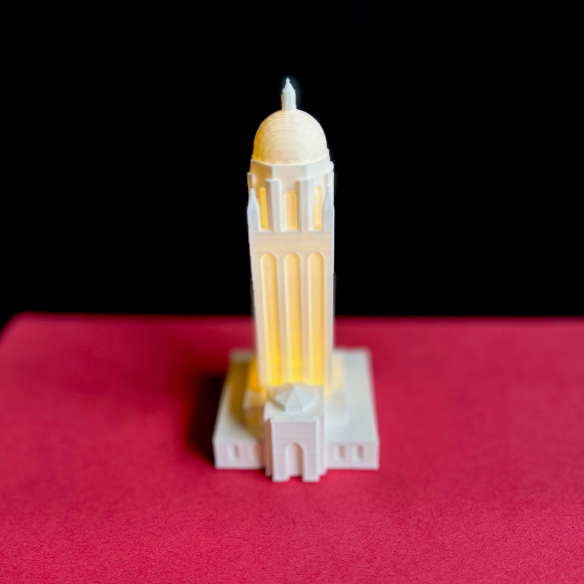 Front view of the lighted Stanford keepsake, a figurine of the Hoover Tower.