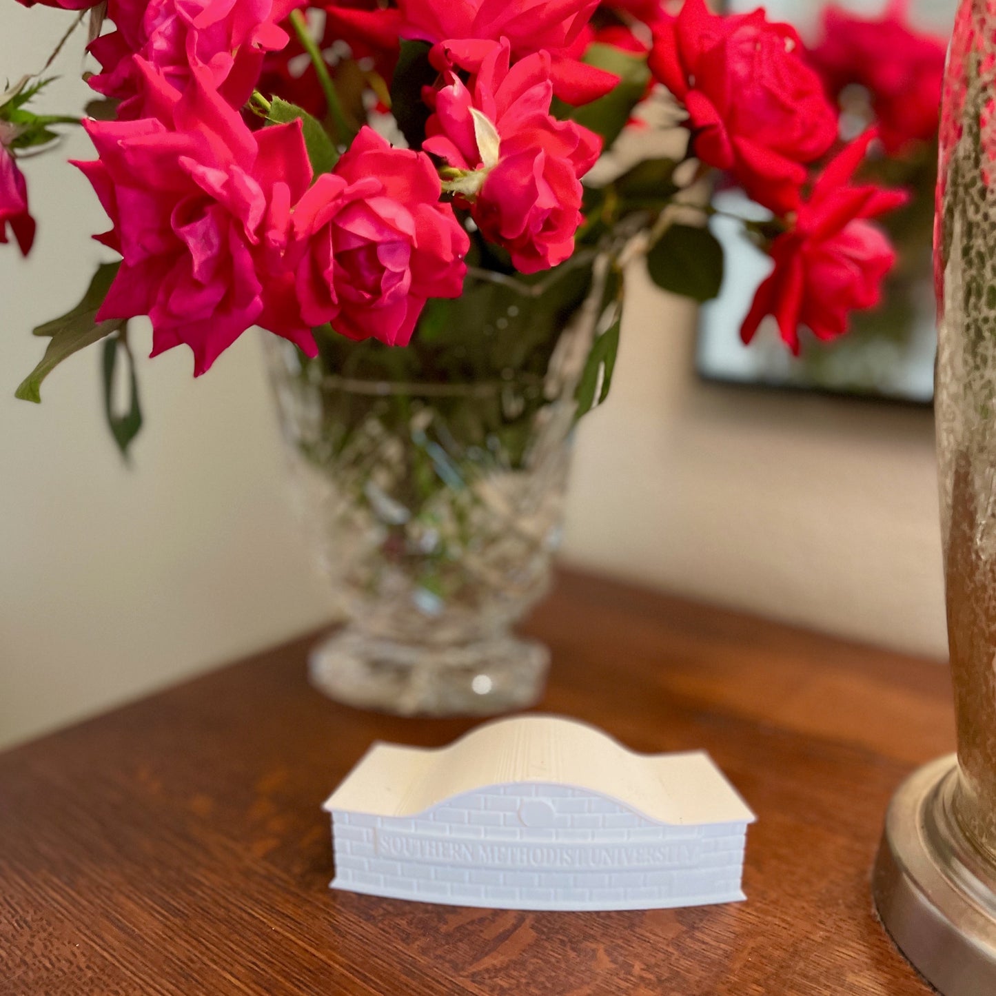 The SMU figurine, shown on a side table.