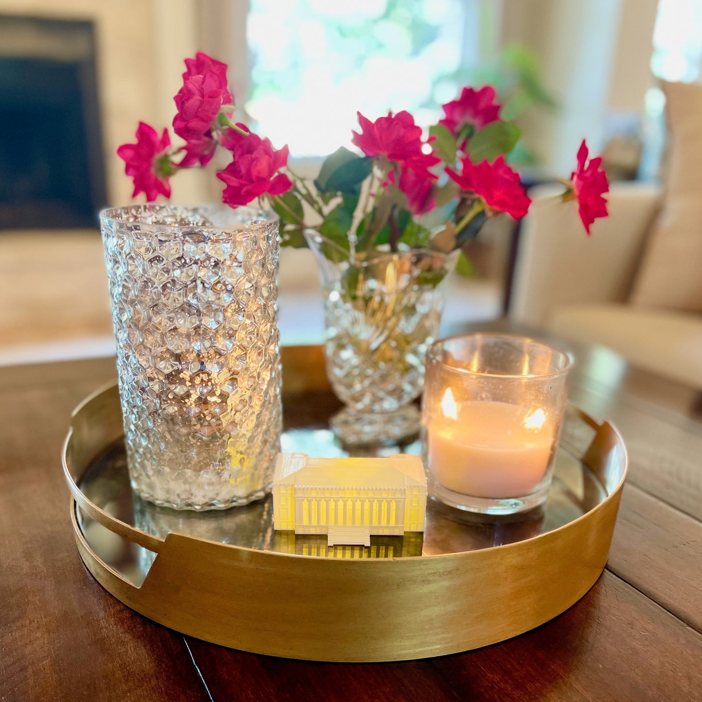 The smaller Texas A&M home decoration, shown on a living room tray.