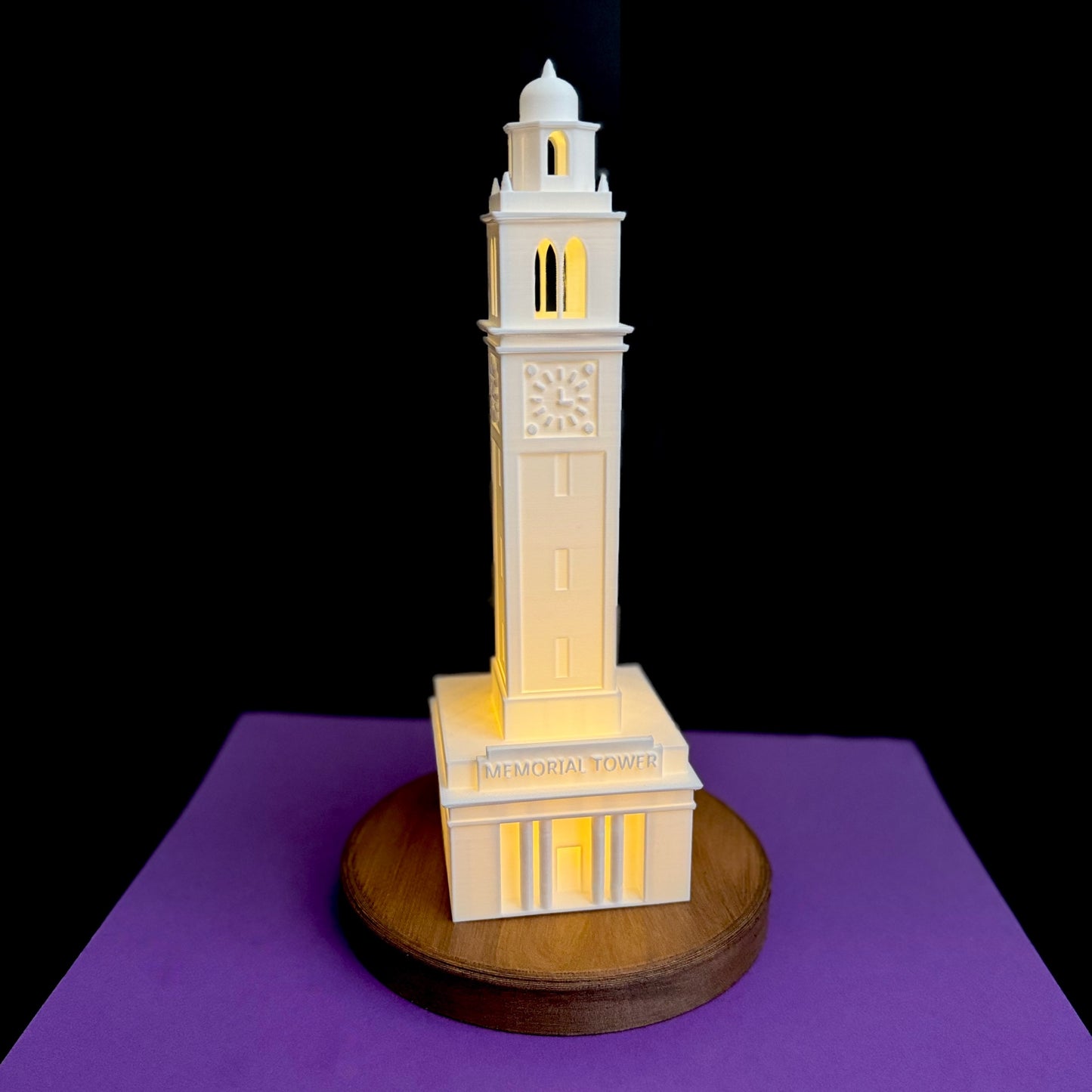 The LSU graduation gift, displayed against a purple background.