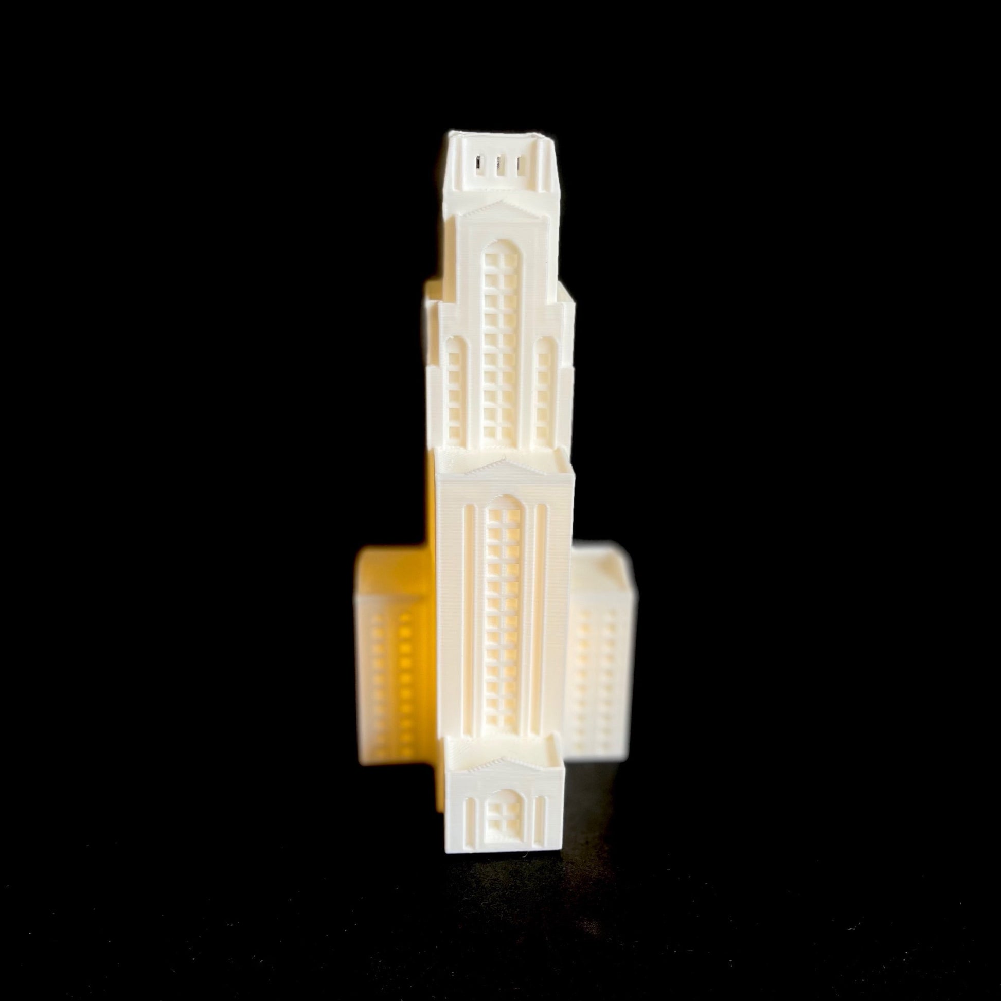 Front view of the 3D printed and lighted University of Pittsburgh campus figurine (a replica of the Pitt Cathy).