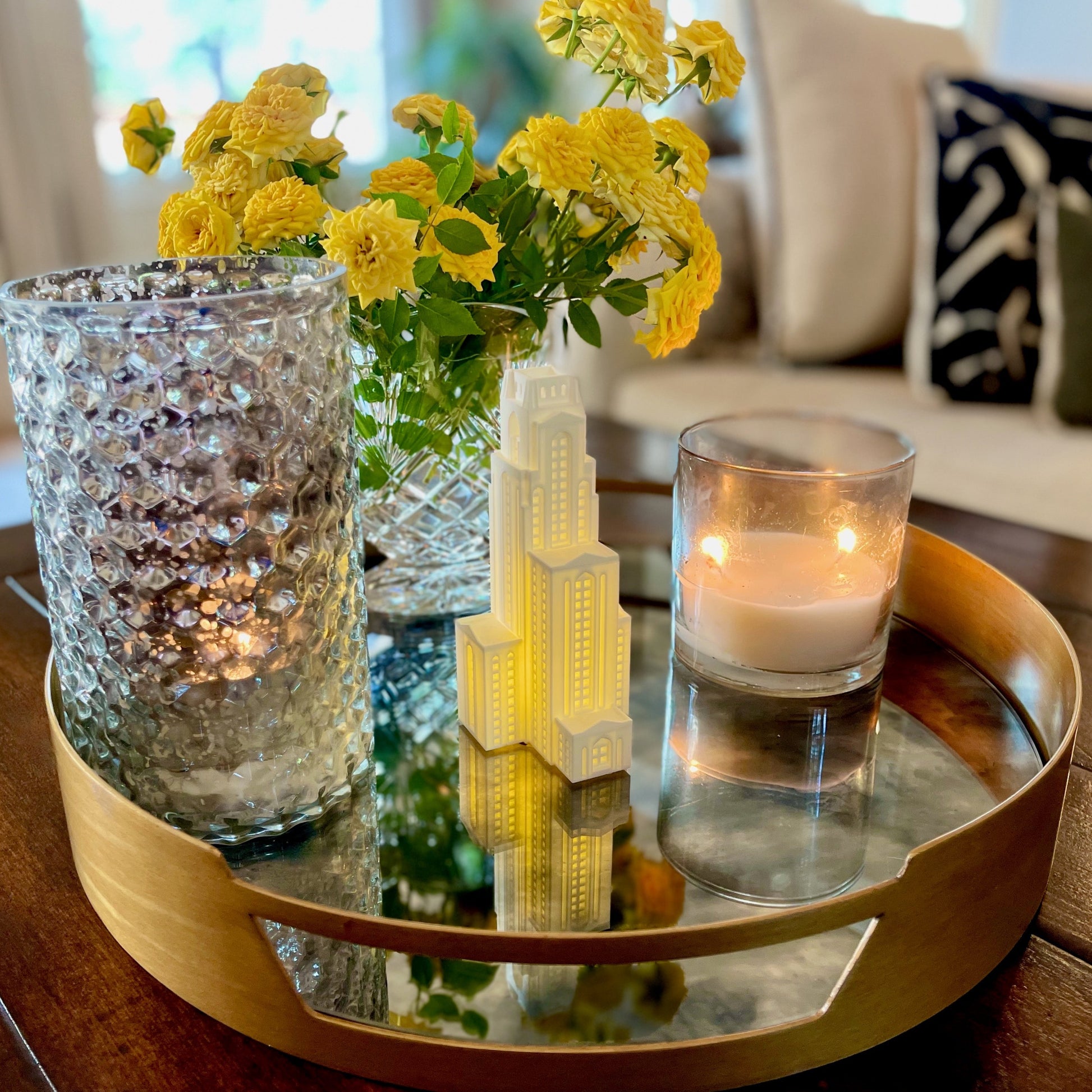 The University of Pittsburgh dorm decoration, shown displayed on a living room table.