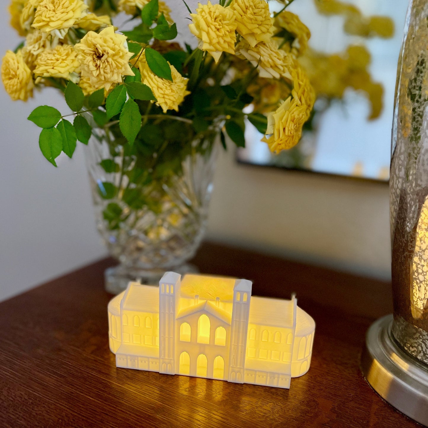 Front view of the UCLA light, shown on a side table.