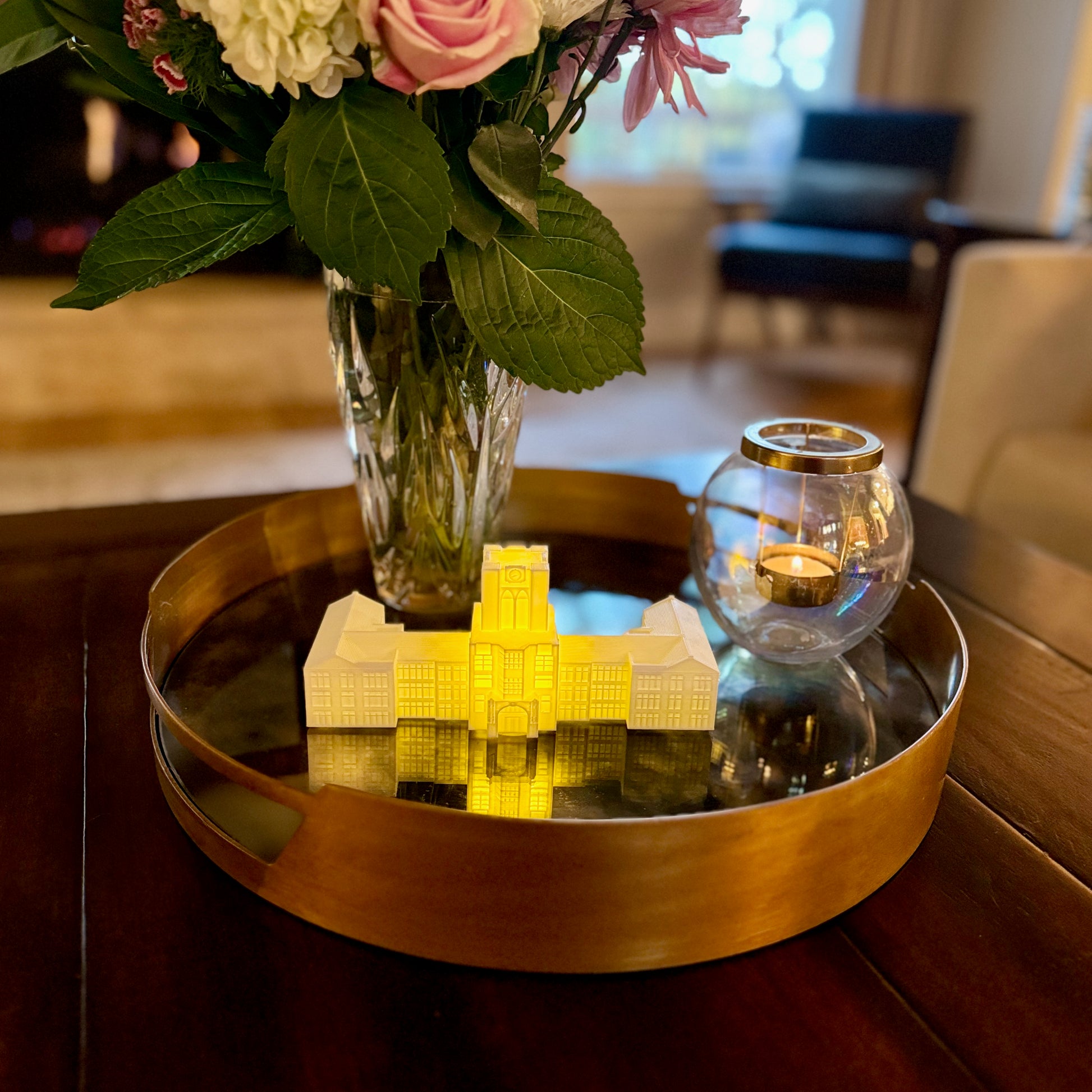 The University of Tennessee art print, shown on a living room tray.