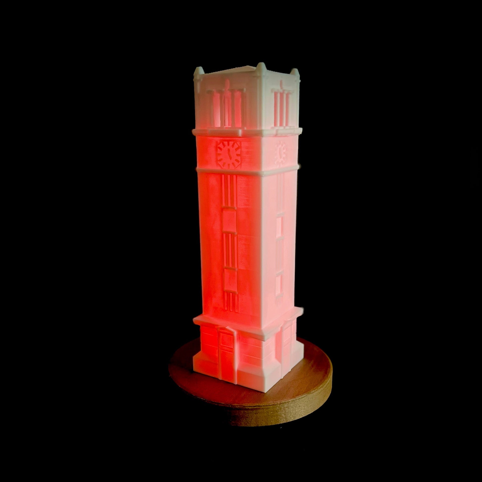 The NC State Tower with a red light, shown in detail.