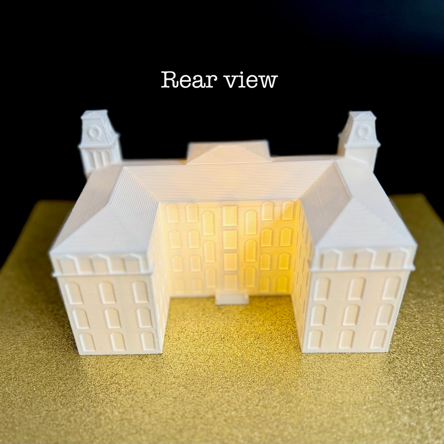 Rear view of the University of Arkansas lighted Old Main figurine.