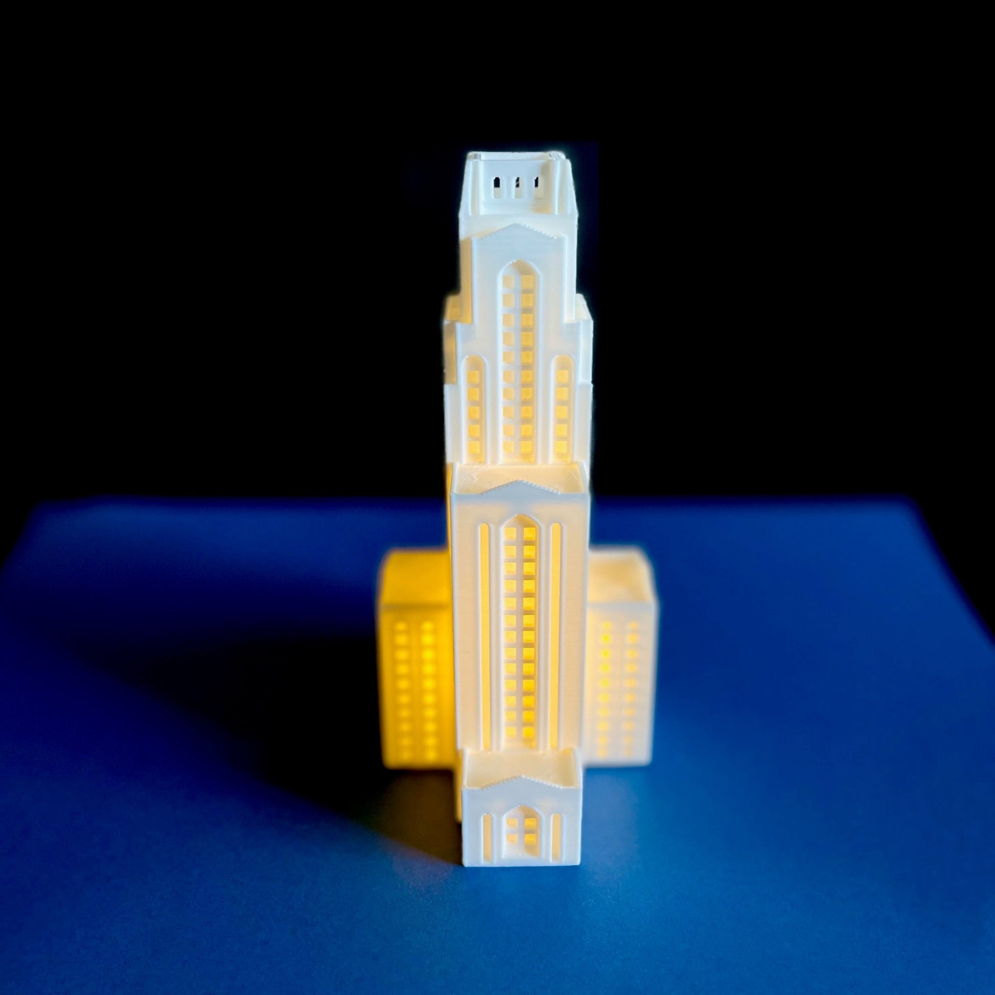 The University of Pittsburgh graduation party decor item, a light designed to look like the Pitt Cathedral of Learning.