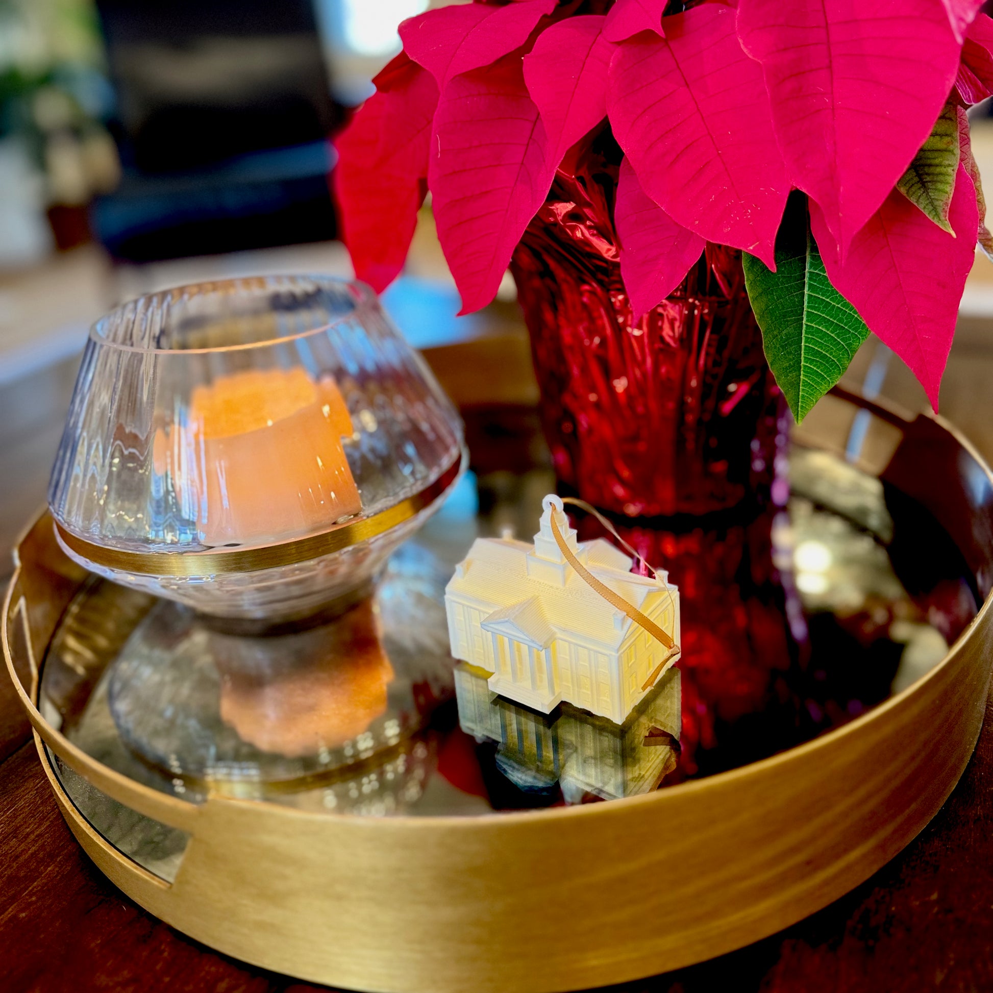 The lighted University of Iowa Christmas decoration, shown in a home decorated for the Holidays.