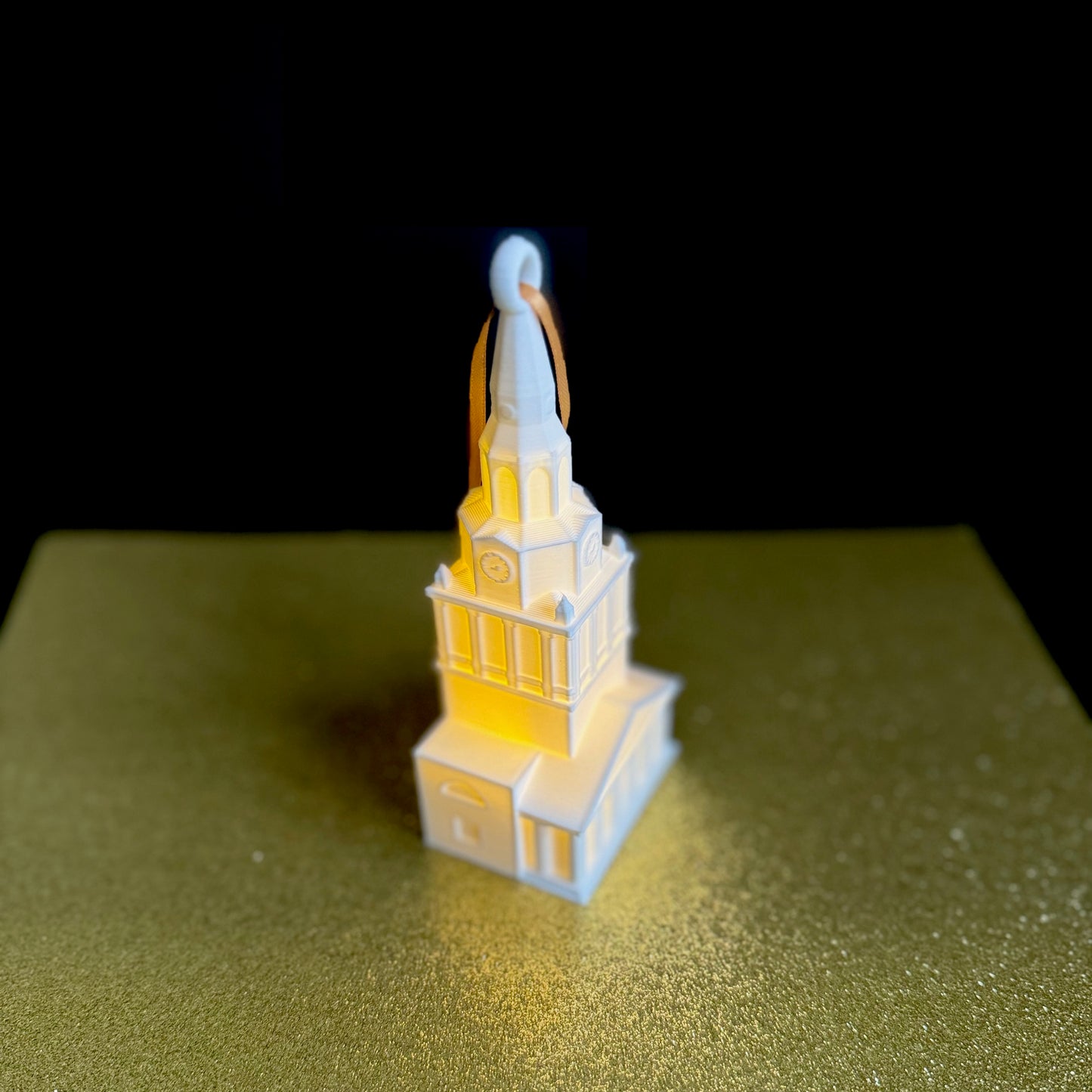 The Wake Forest Demon Deacons ornament, shown against a gold background.