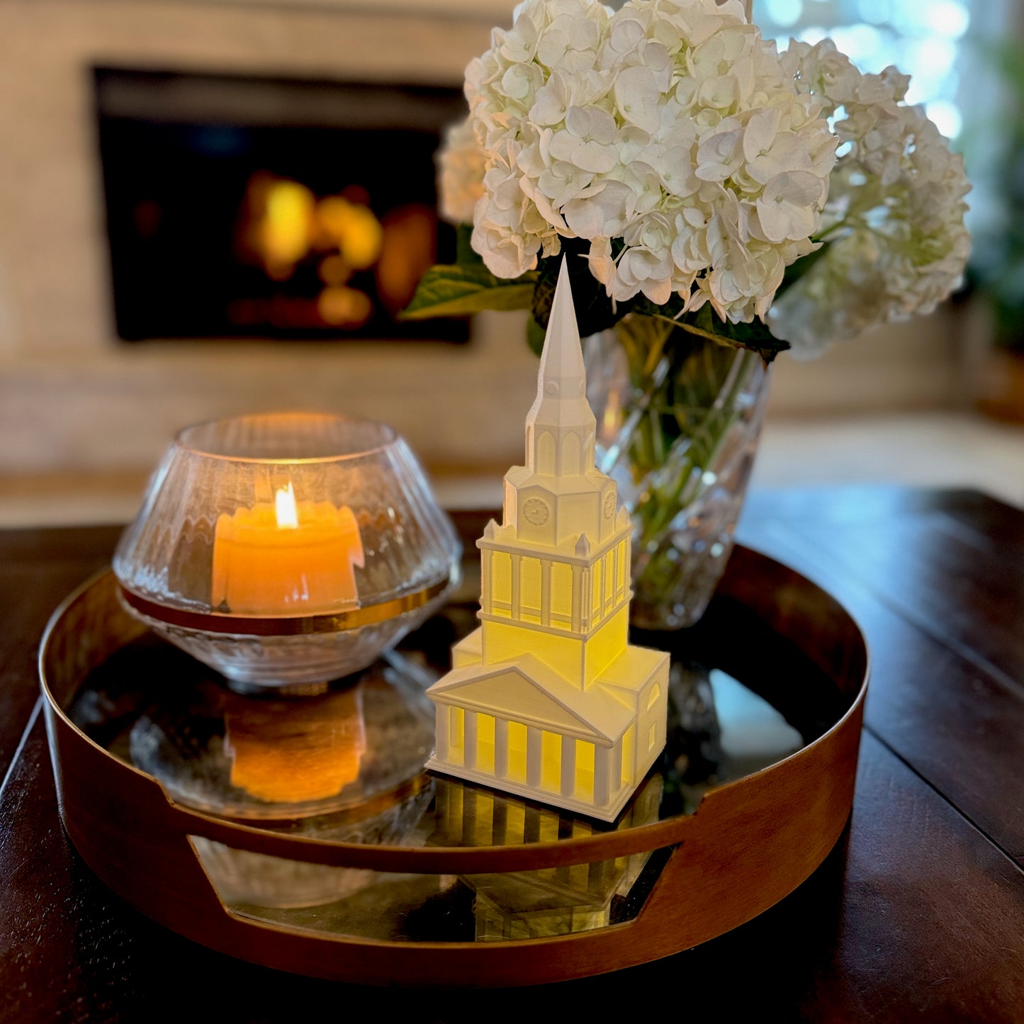 The Wake Forest 3D print of the Wait Chapel, shown on a living room side table.