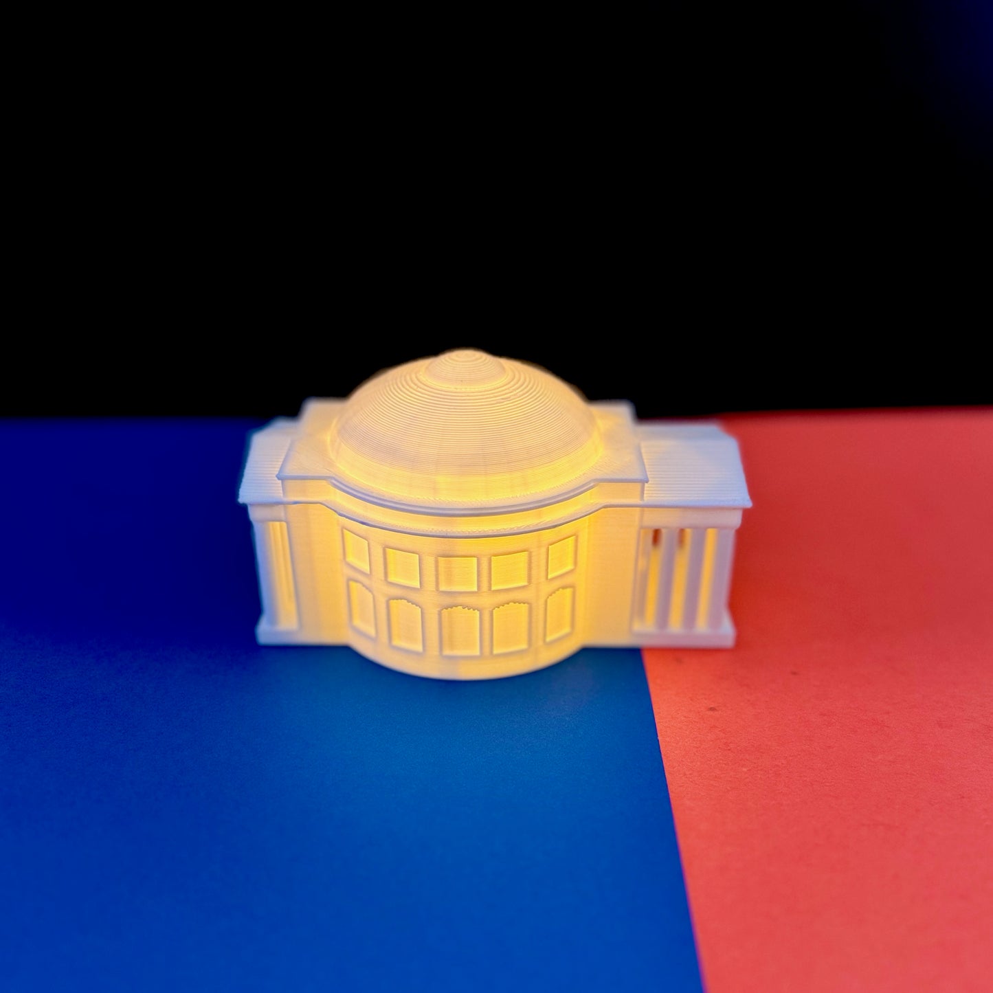 Side view of the UVA Rotunda dorm decoration, displayed in school colors.