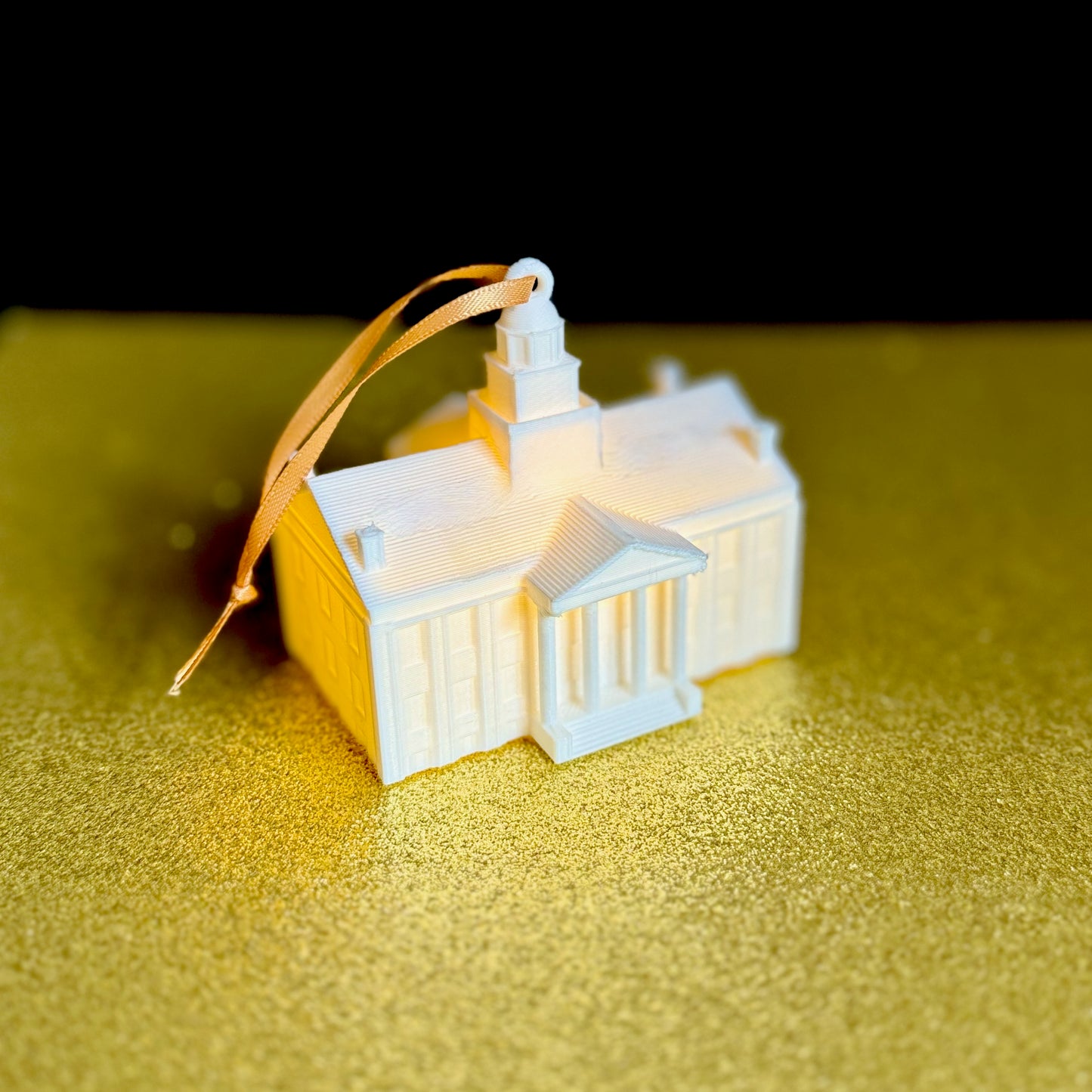 The University of Iowa lighted ornament, designed as a replica of the Old Capitol building.