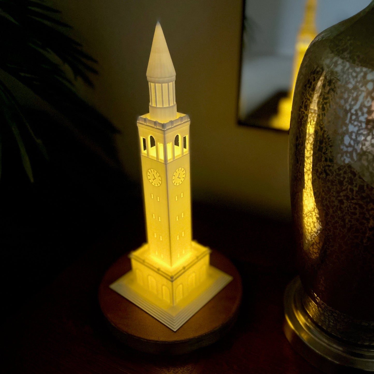 The UNC lamp, shown on a bedroom side table.