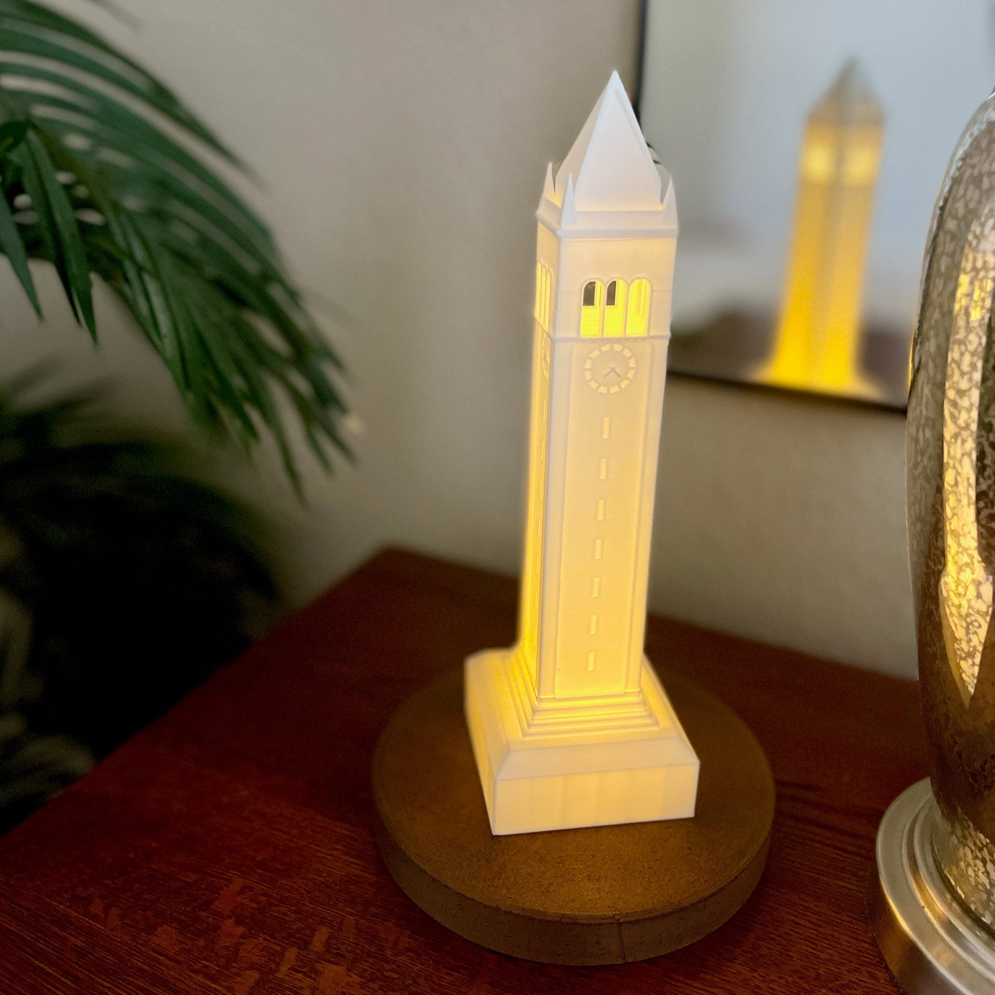 The Berkeley Campanile light, used as home decor and shown on a side table.