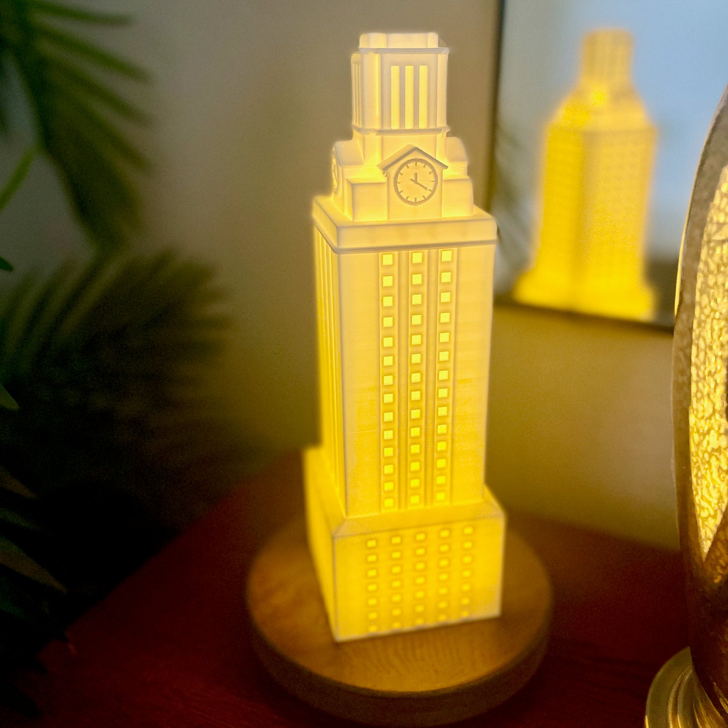 The University of Texas dorm decoration, shown on a bedroom side table.