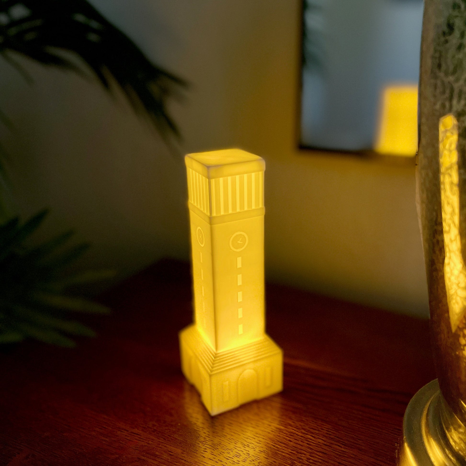 The Texas A&M home decor light, shown on a side table.