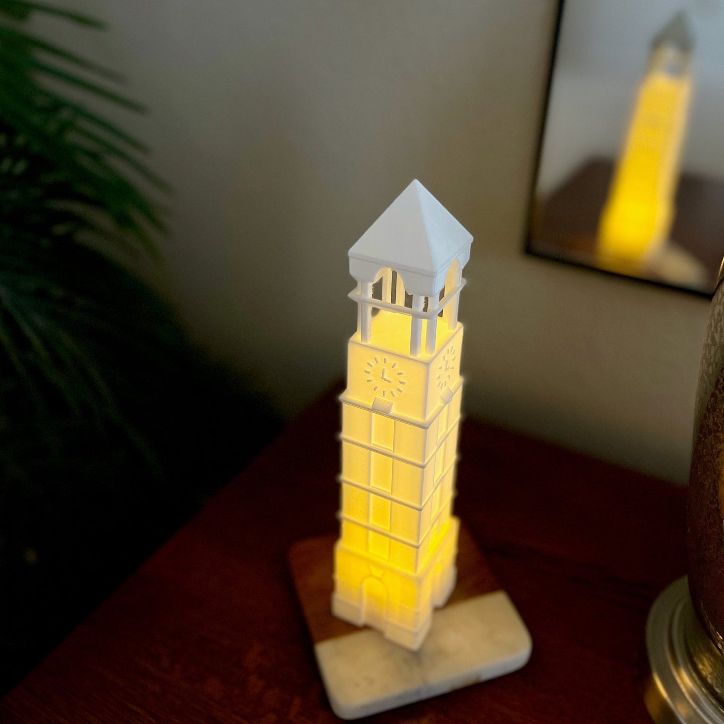 The Purdue tower light, shown on a bedroom side table.