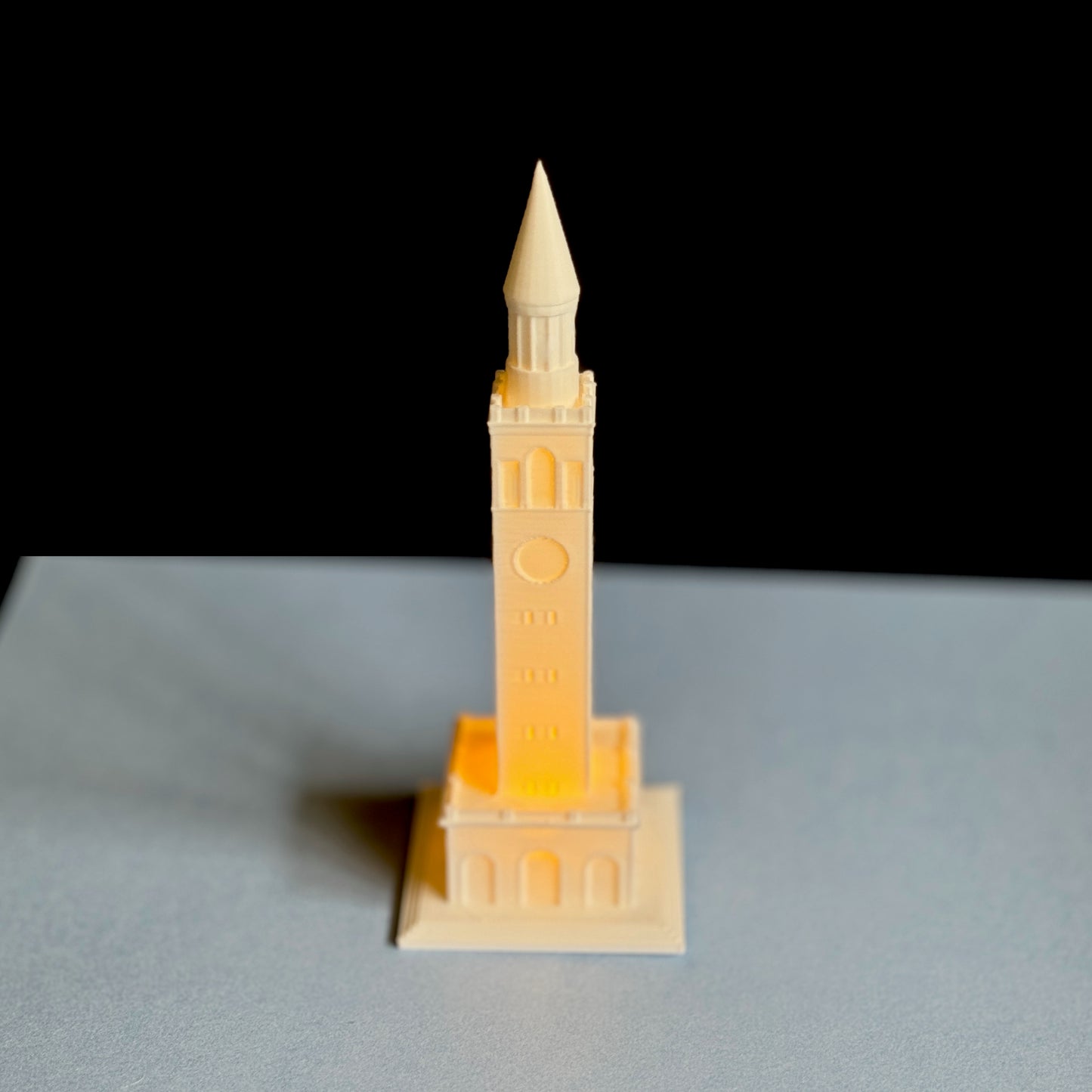 Front view of the UNC keepsake figurine, designed as a replica of the UNC Bell Tower.